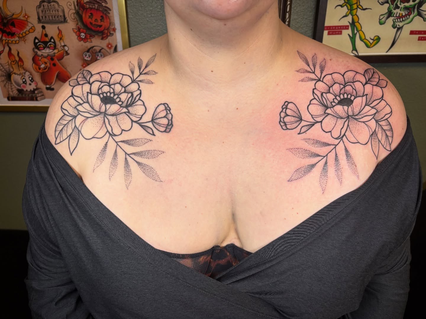 Floral arrangement dotwork tattoo on the shoulder by Malia Clark