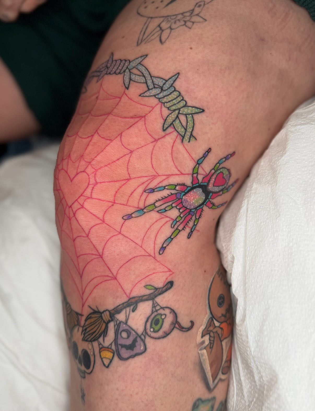 Spider and web new school tattoo on the forearm by Brandi 🕷, Mentor, Ohio