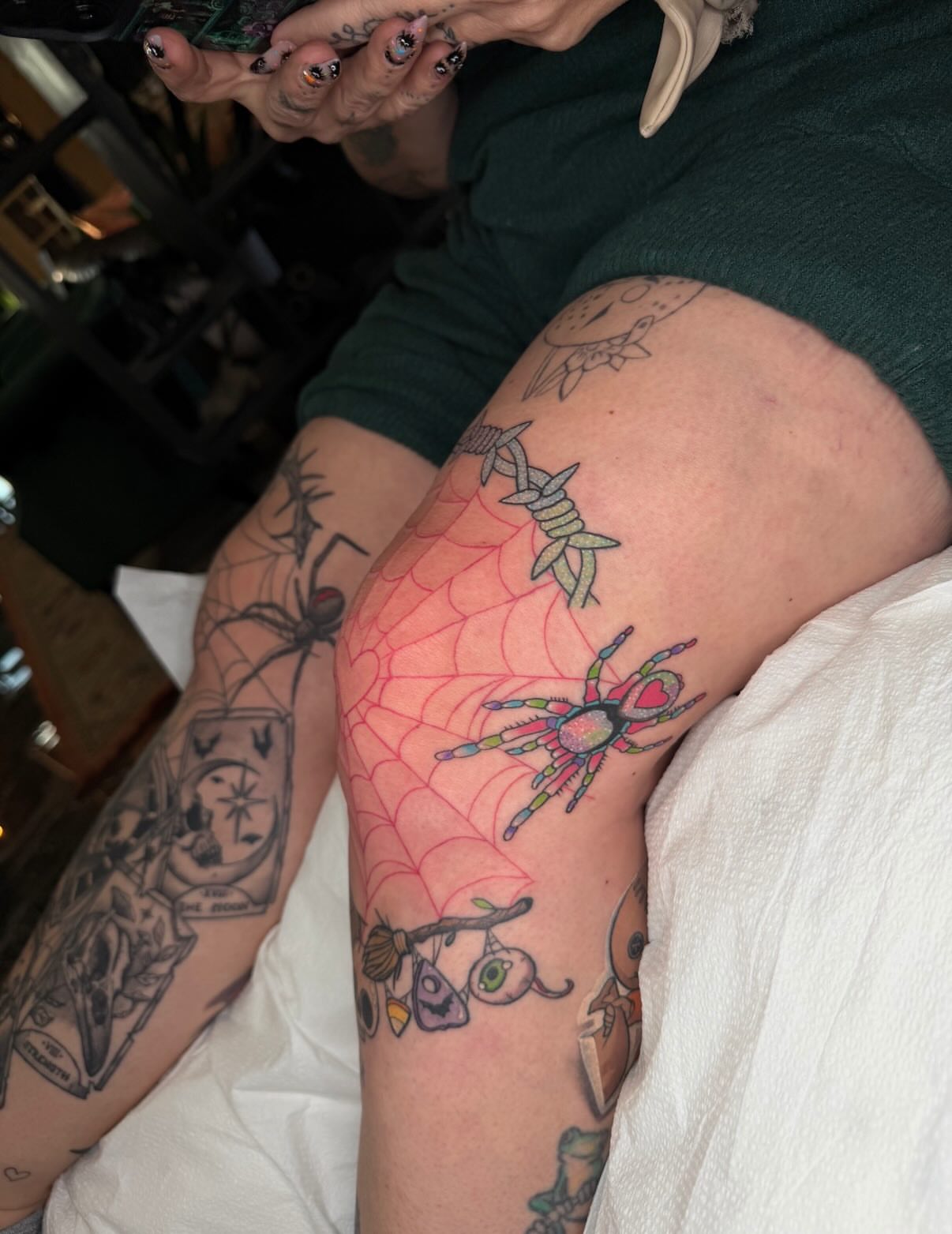 Spider and web new school tattoo on the thigh by Brandi 🕷, Mentor, Ohio