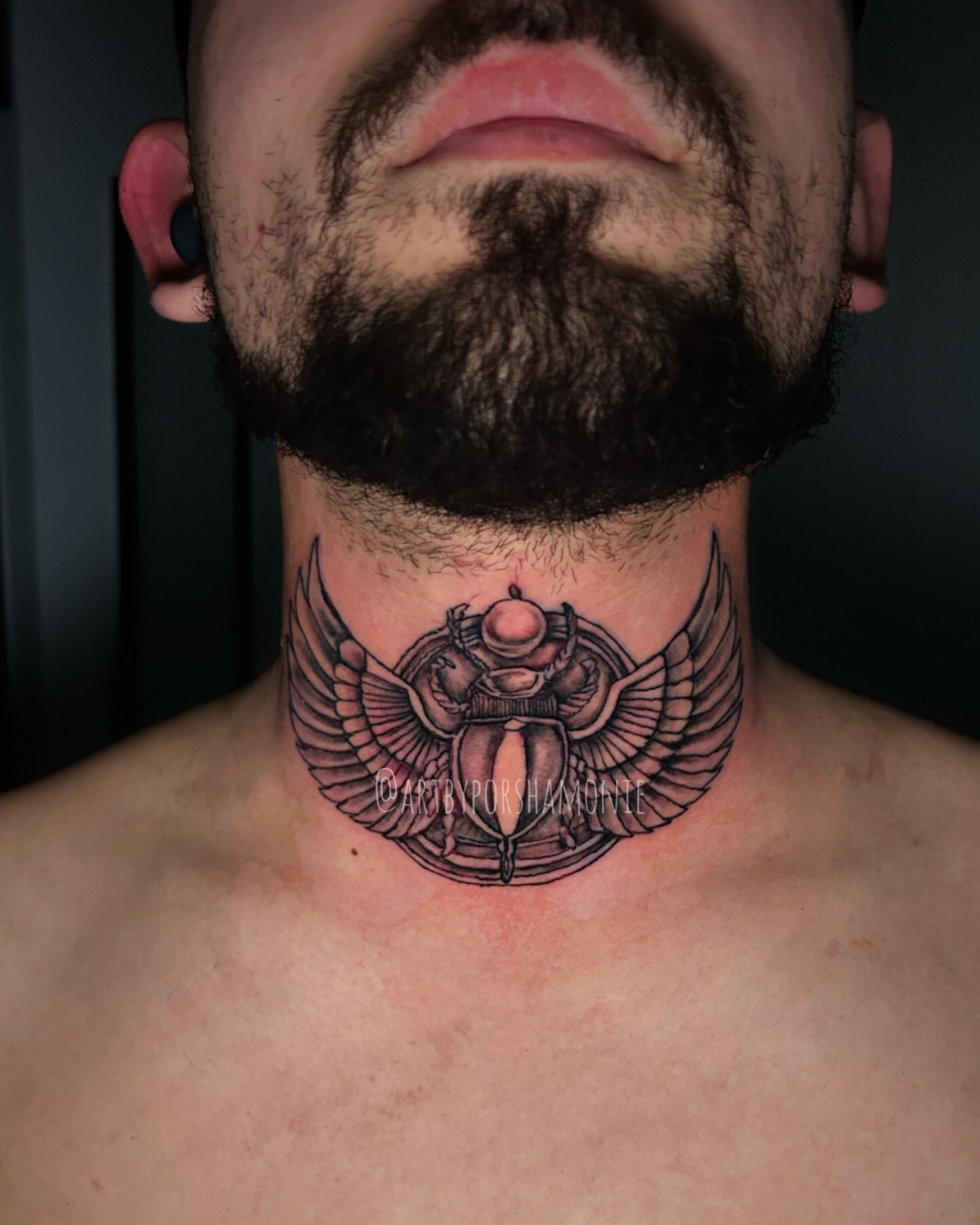 Scarab beetle with wings black and grey tattoo on the neck by Porshamonie' THE Tattoo ARTIST