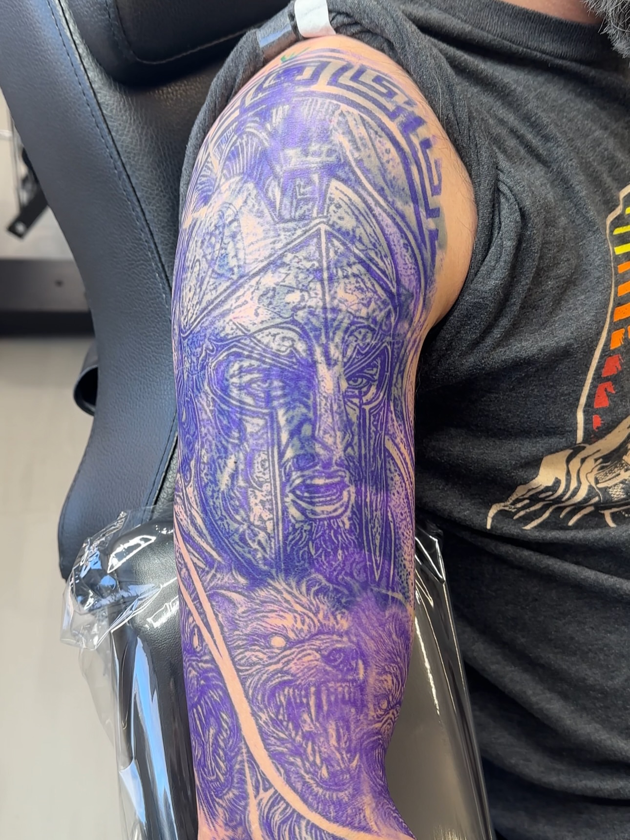 Warrior and beast realism tattoo on the forearm by Nathan, Charlotte, North Carolina