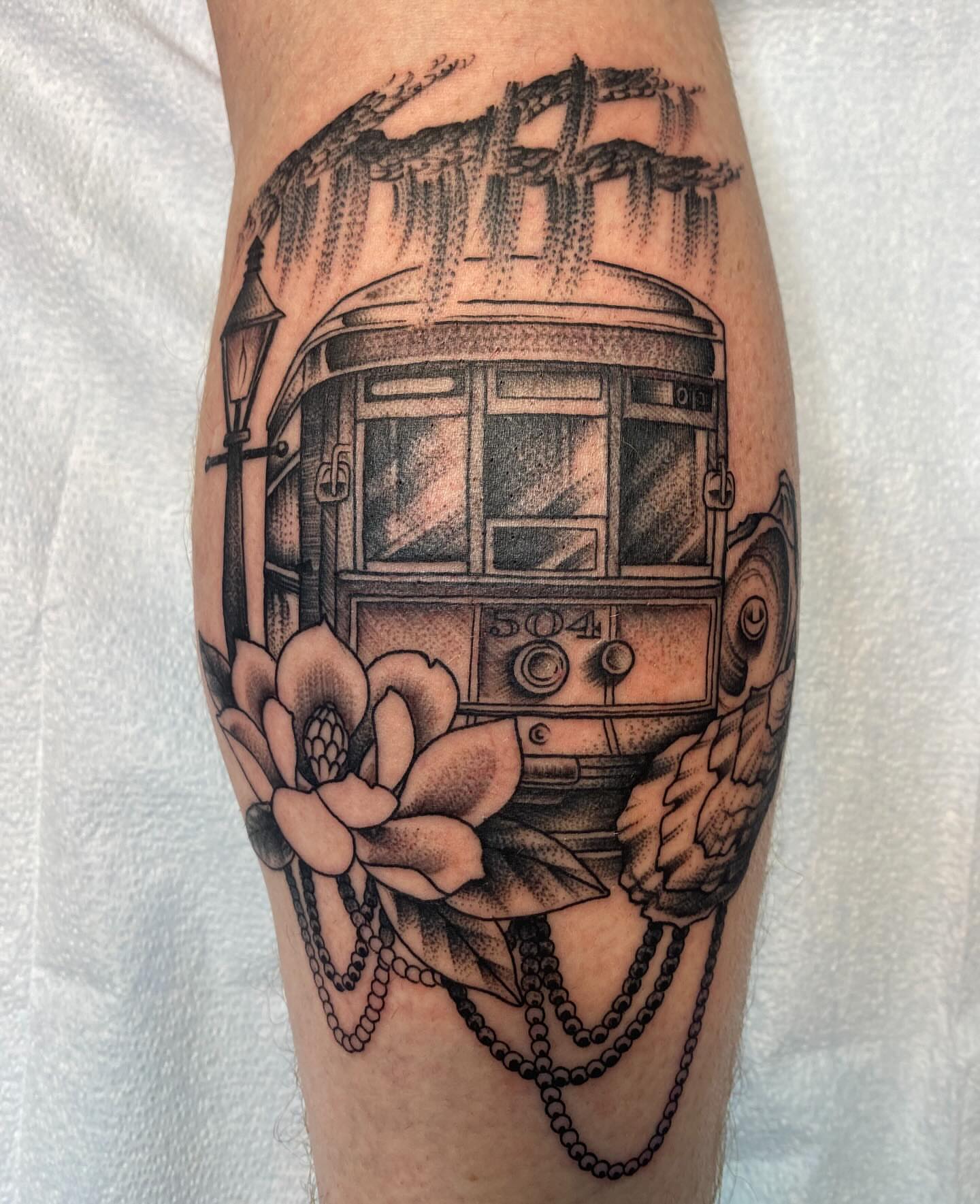 Streetcar and flowers dotwork tattoo on the forearm by Vivian HavaTattoo, Richmond, Virginia