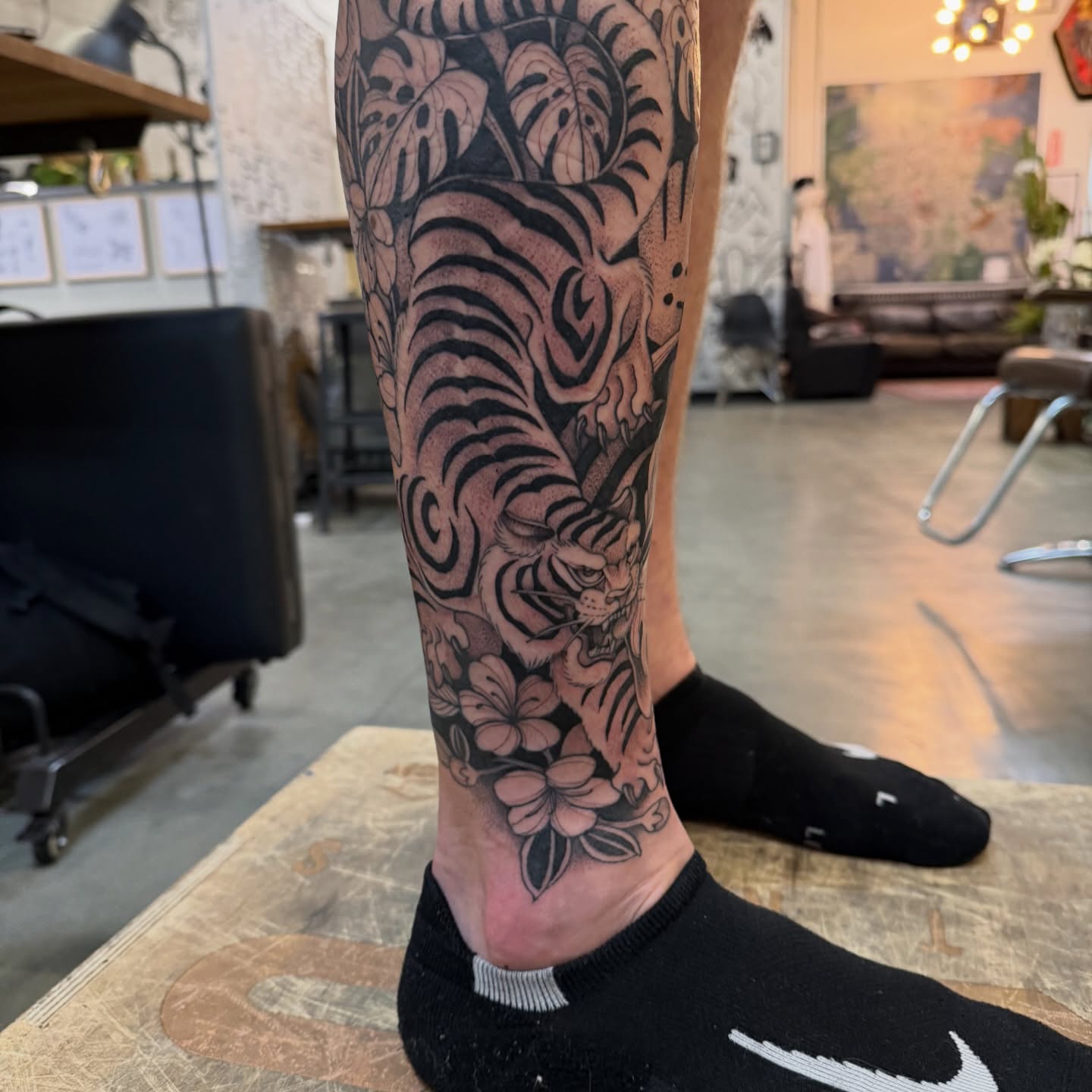 Tiger and flowers black and grey tattoo on the calf by 🥀michael Ta 🥀