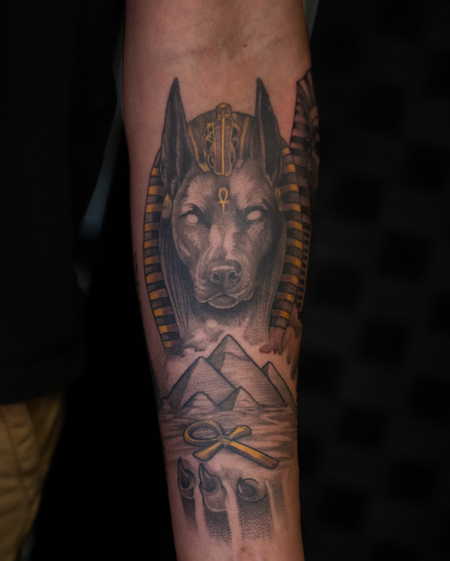 Ancient egyptian god realism tattoo on the forearm by Chris Estrada
