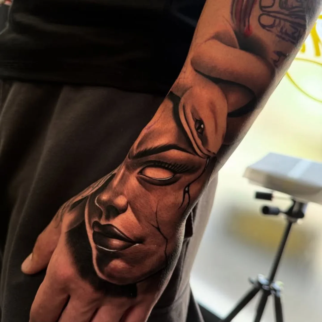 Woman's face realism tattoo on the forearm by ink.alchemist