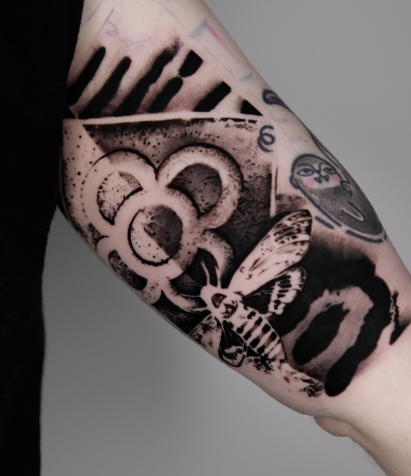 Insect and owl geometric tattoo on the forearm by 𝐌𝐀𝐊𝐒𝐈𝐌 𝐏𝐀𝐓𝐑𝐈𝐂𝐊