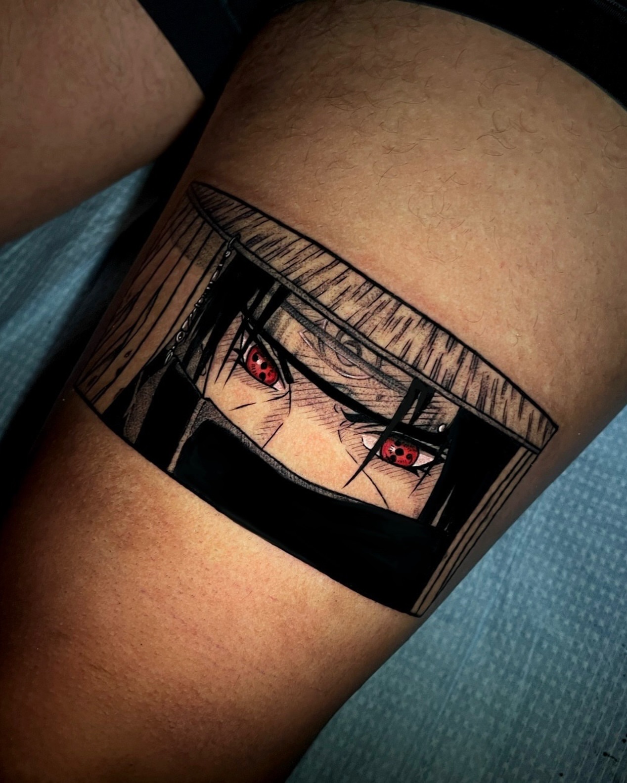 Anime character anime tattoo on the thigh by Montreal Tattoo Artist