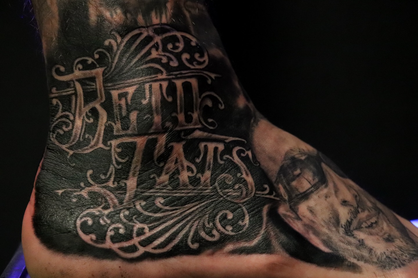 Lettering lettering script tattoo on the neck by Beto Tats, Round Rock, Texas