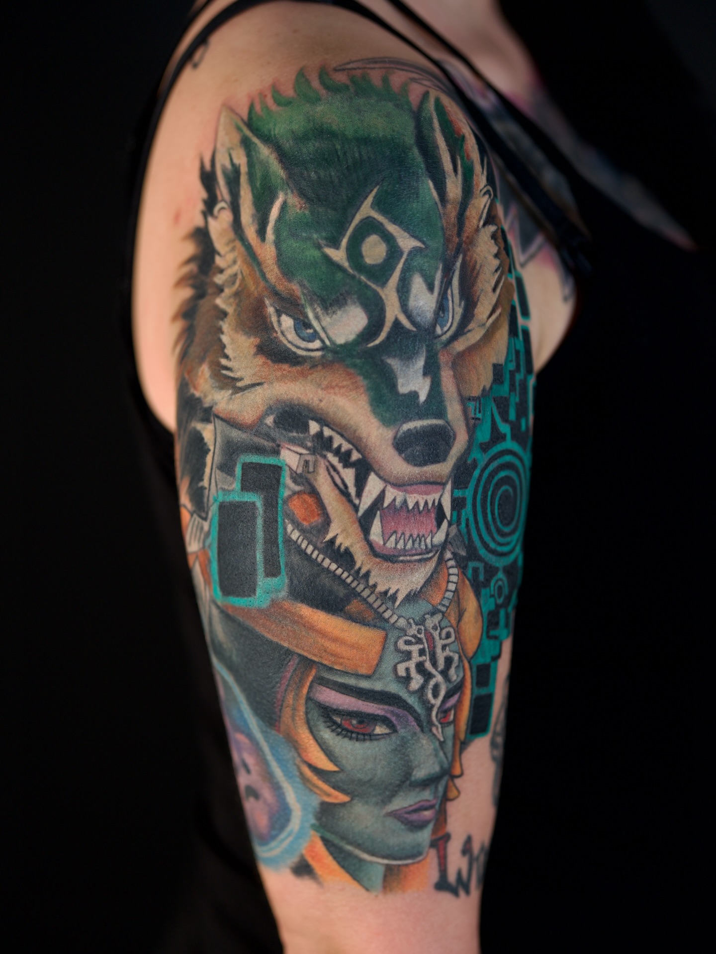 Wolf and woman geometric tattoo on the forearm by Chris Lochbihler