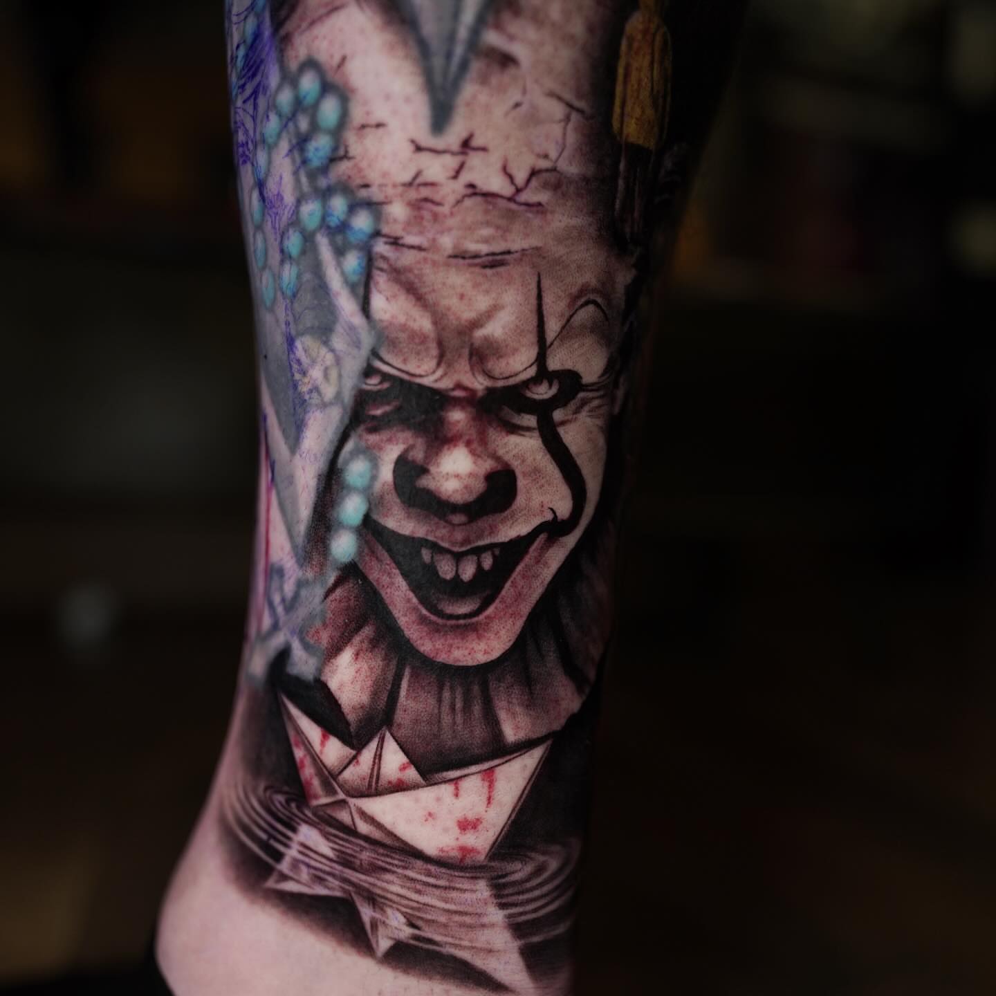 Clown realism tattoo on the forearm by Erick Satchell II