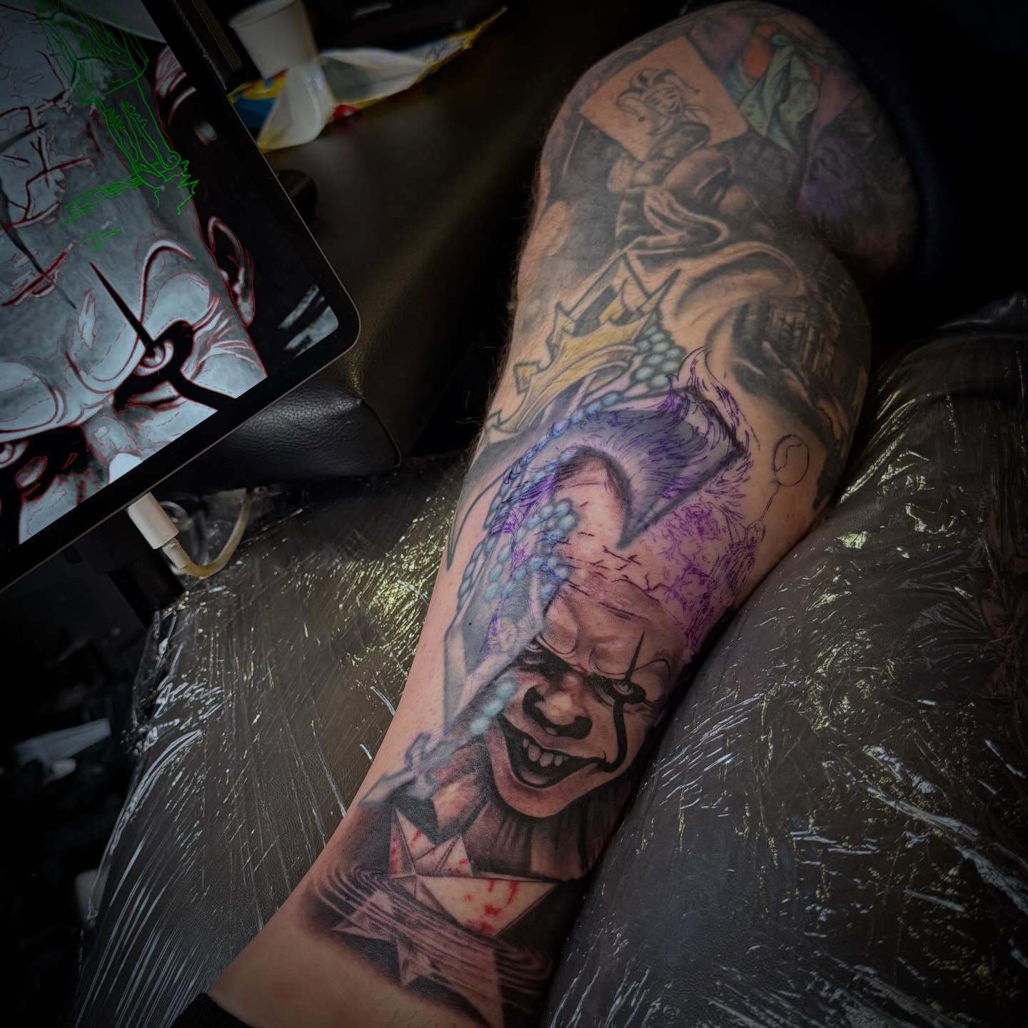 Clown dark realism tattoo on the forearm by Erick Satchell II