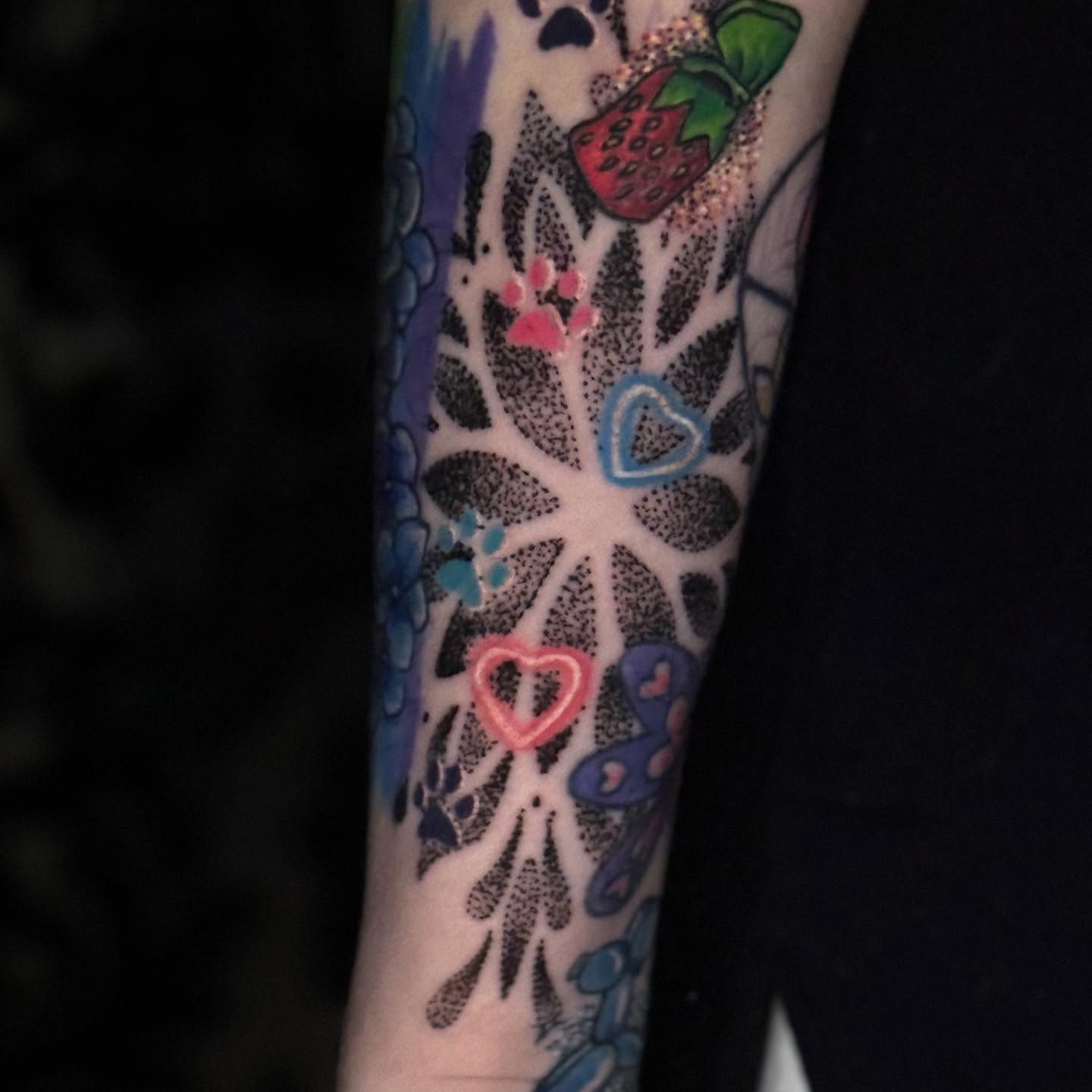 Strawberry and floral dotwork tattoo on the forearm by Jacob Bettker, Centerville, Ohio