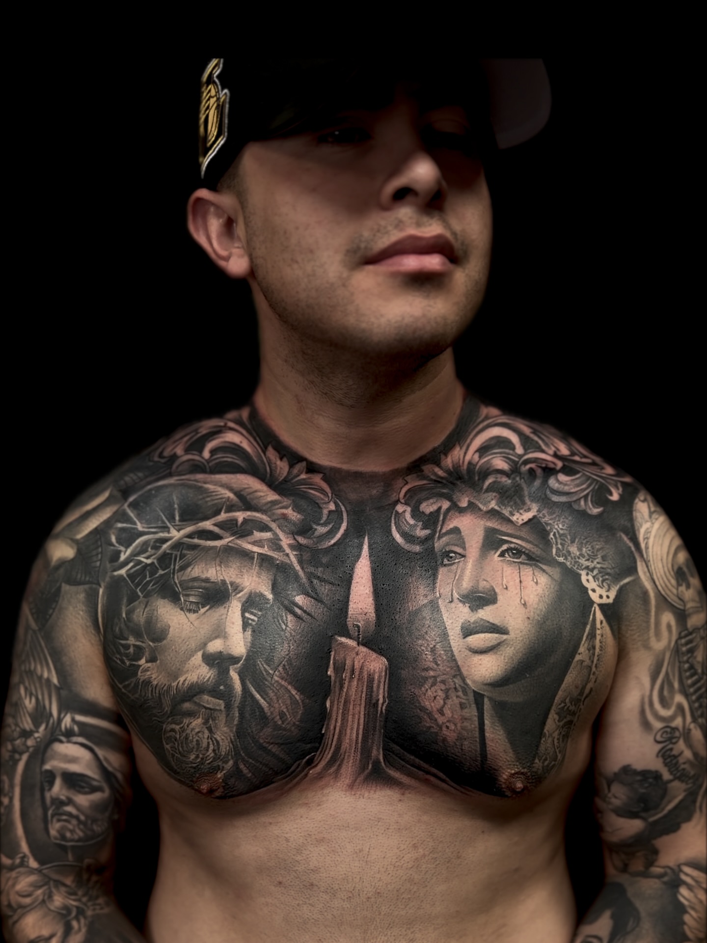 Religious figures realism tattoo on the chest by Raul Rodriguez