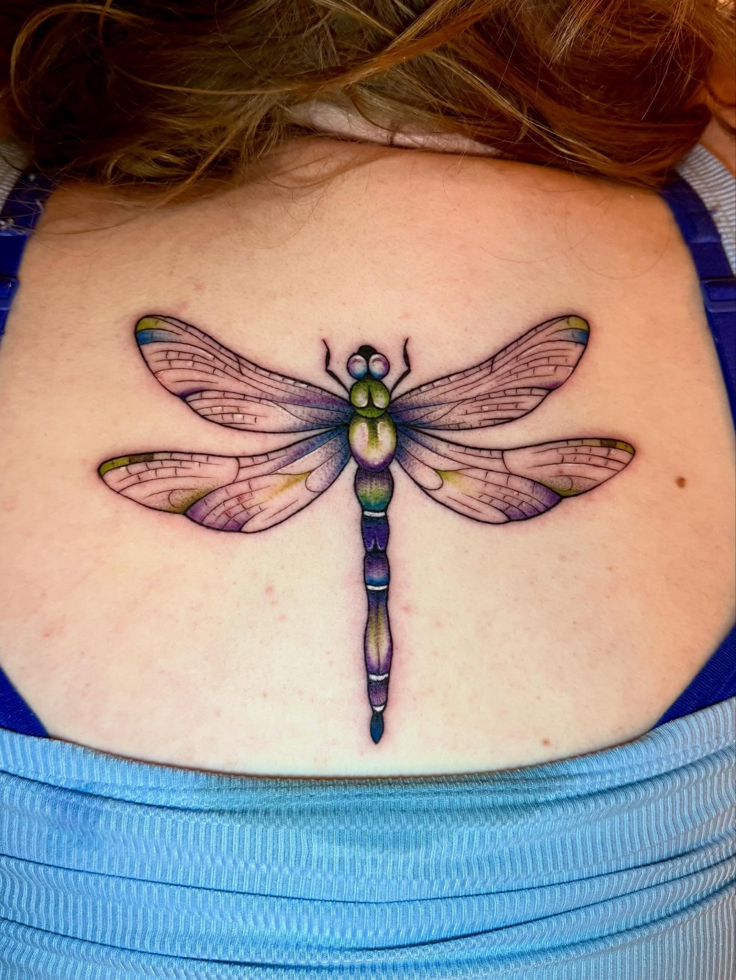 Dragonfly dotwork tattoo on the back by Morgan Peeples
