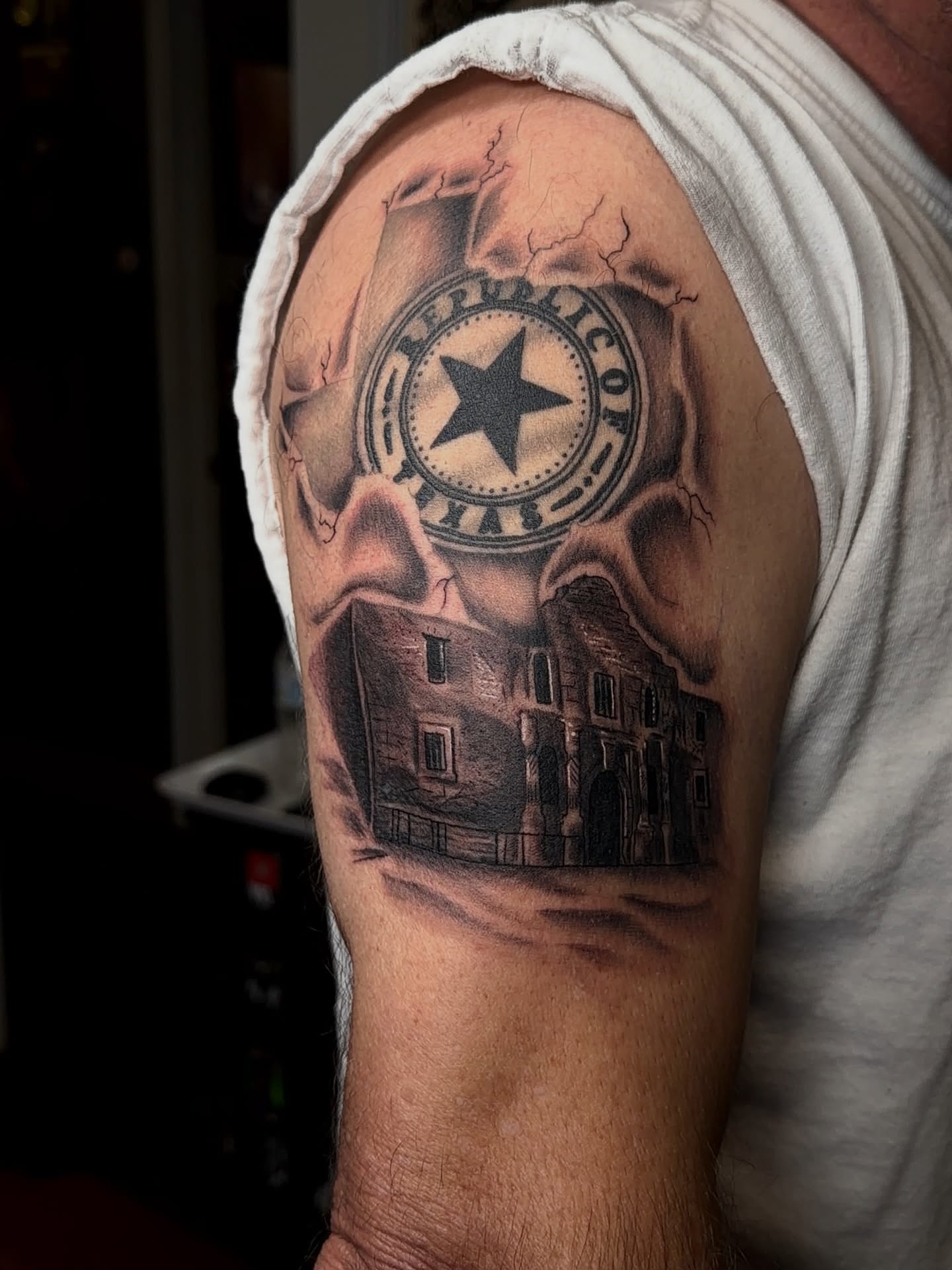 Republic of Texas seal realism tattoo on the shoulder by Denis Seregin