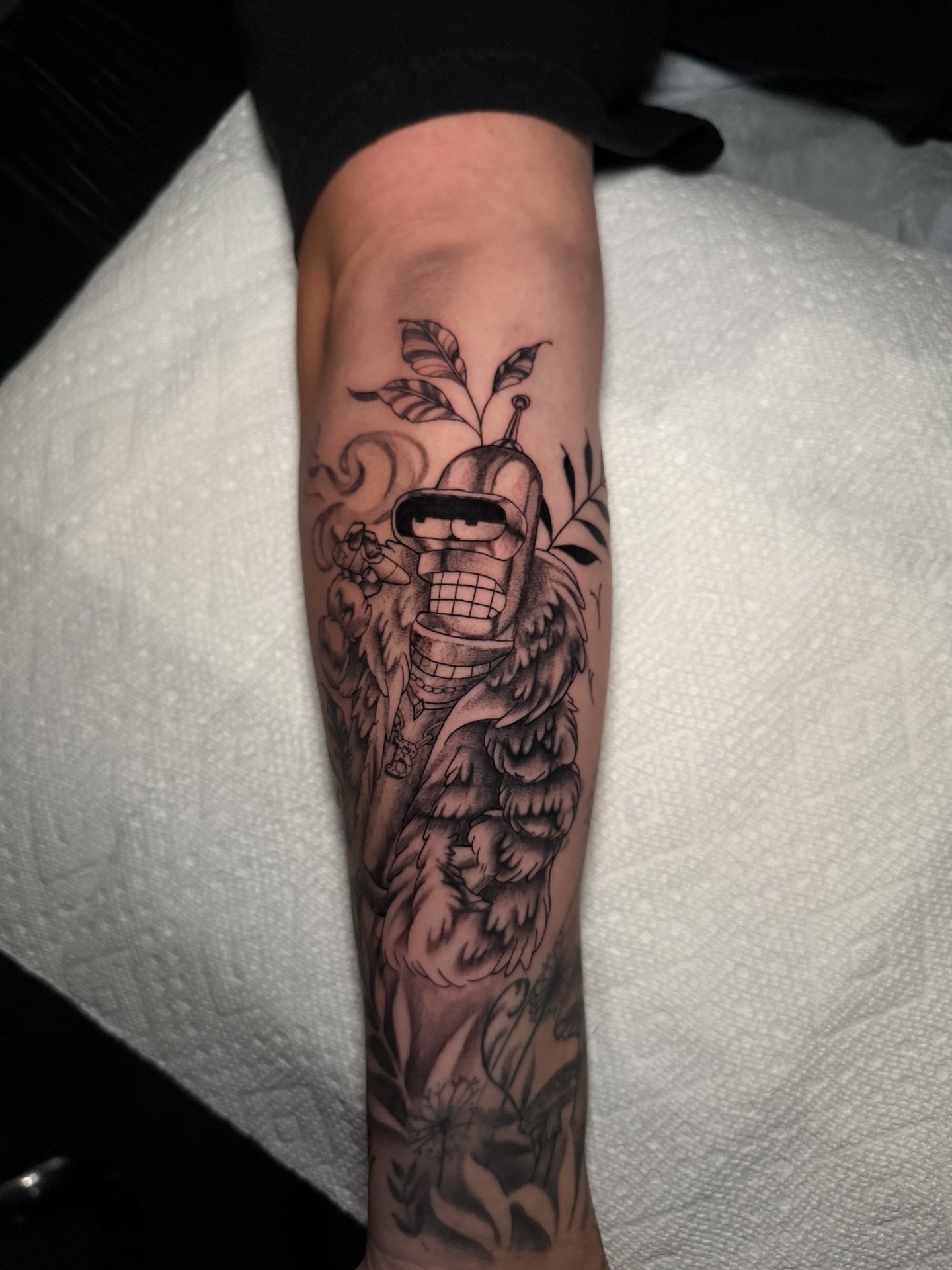 Robot with plant realism tattoo on the forearm by 𝕹𝖆𝖙