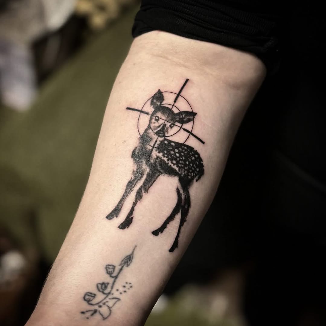 Deer with target fine line tattoo on the forearm by Ink of Winchester