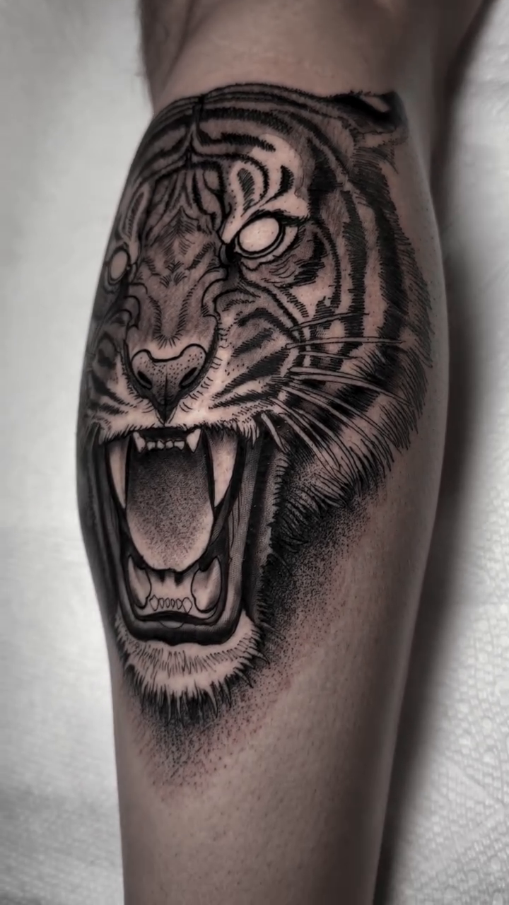 Tiger head realism tattoo by David Mushaney
