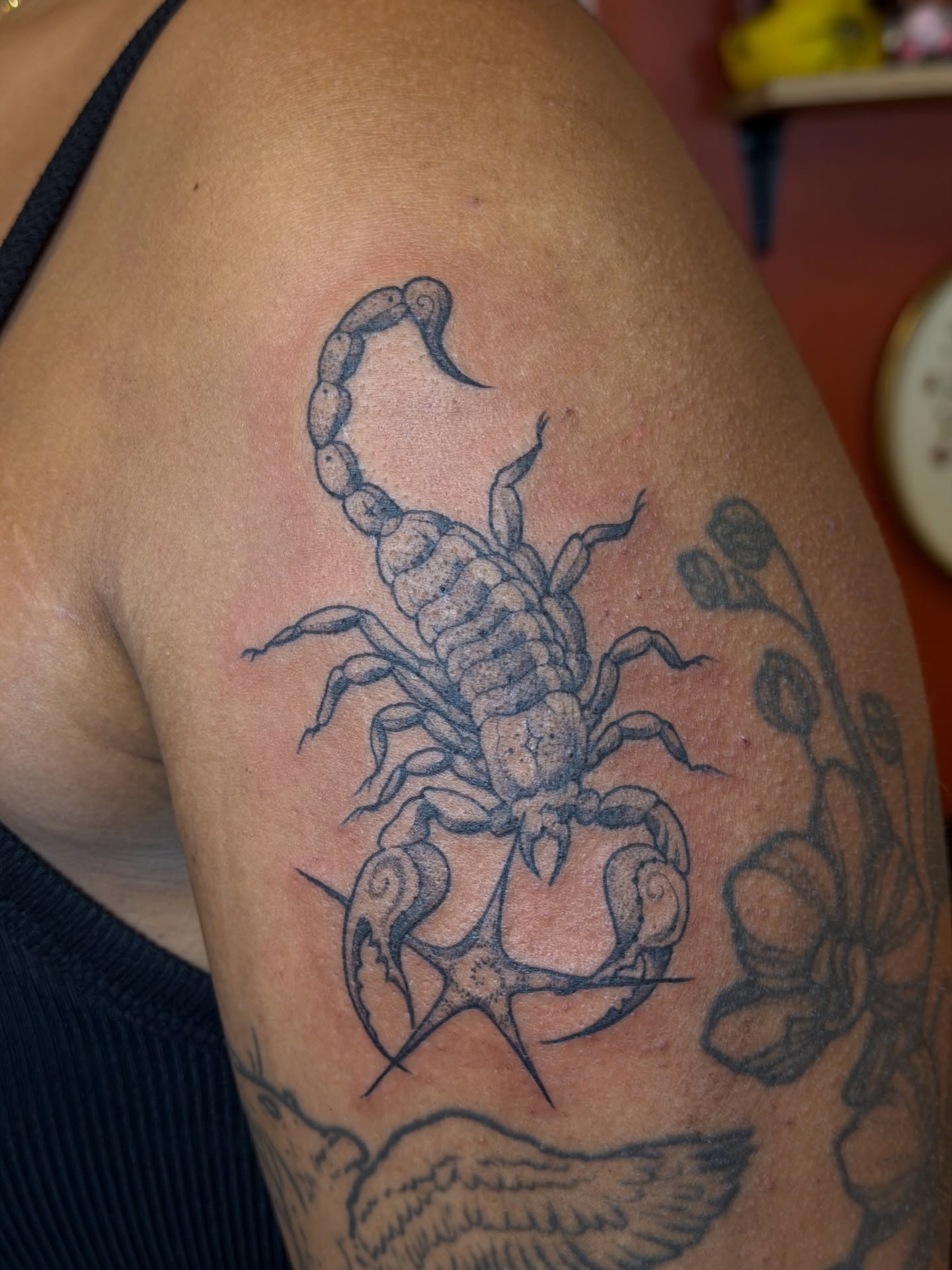 Scorpion black and grey tattoo on the shoulder by Gianna Calisi
