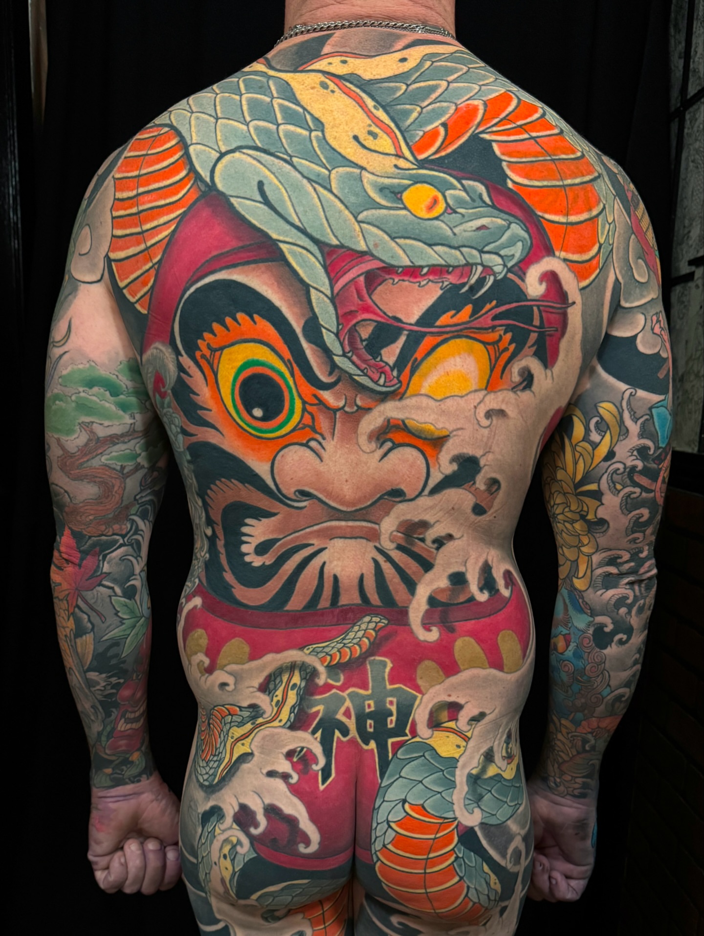 Demon face with snake japanese irezumi tattoo on the back by Las Vegas Japanese Tattoo Artist, Las Vegas, Nevada