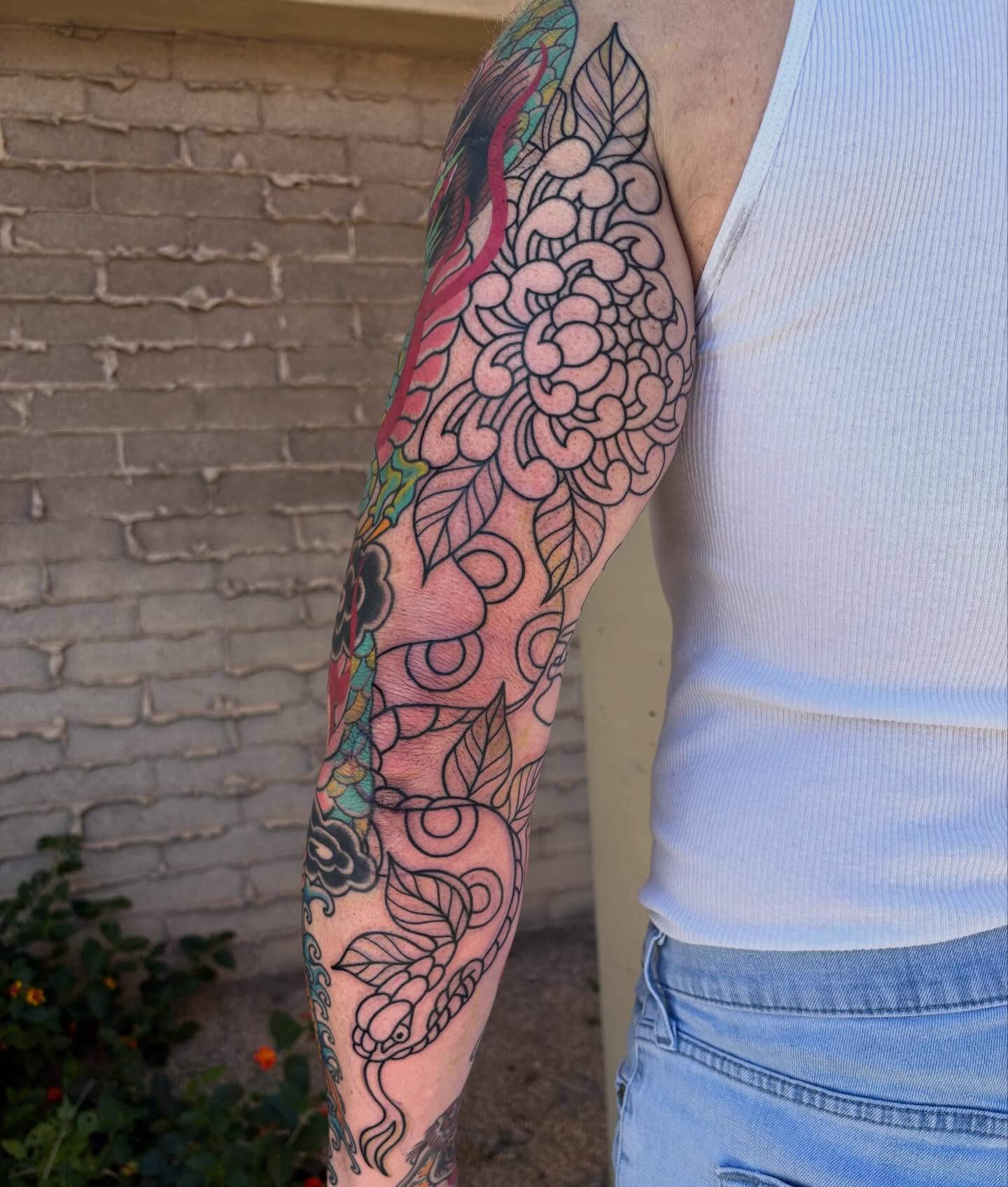 Floral pattern ornamental tattoo on the forearm by Allyson Monique