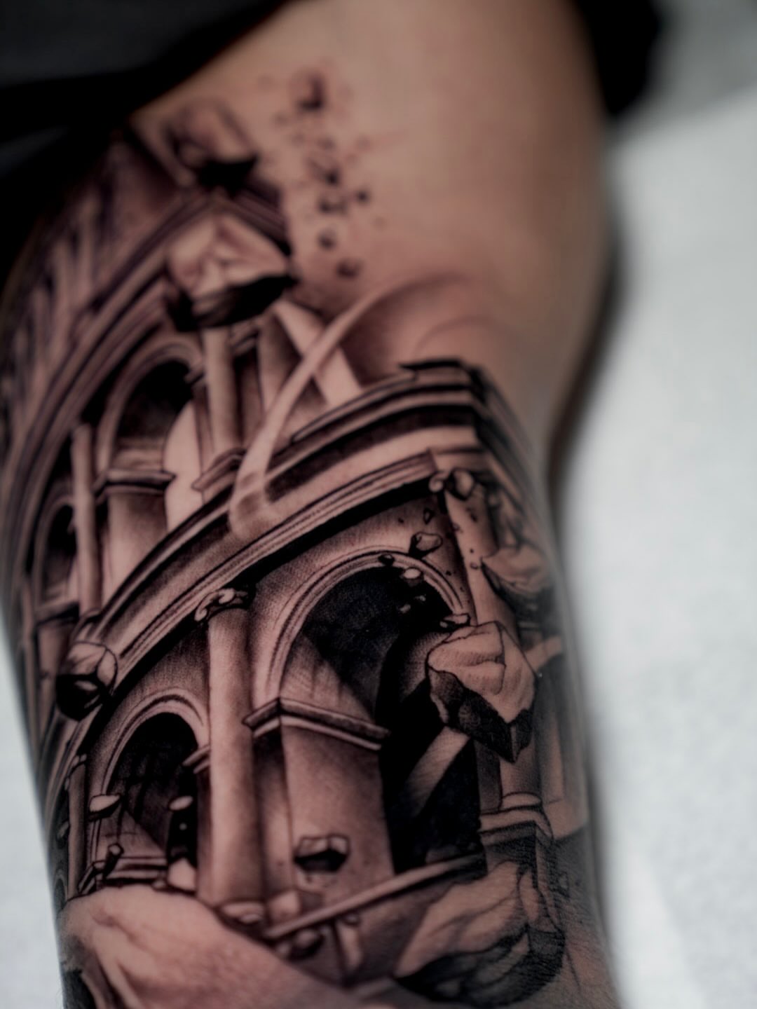 Building facade black and grey tattoo on the forearm by CRISTIAN AMORES シ