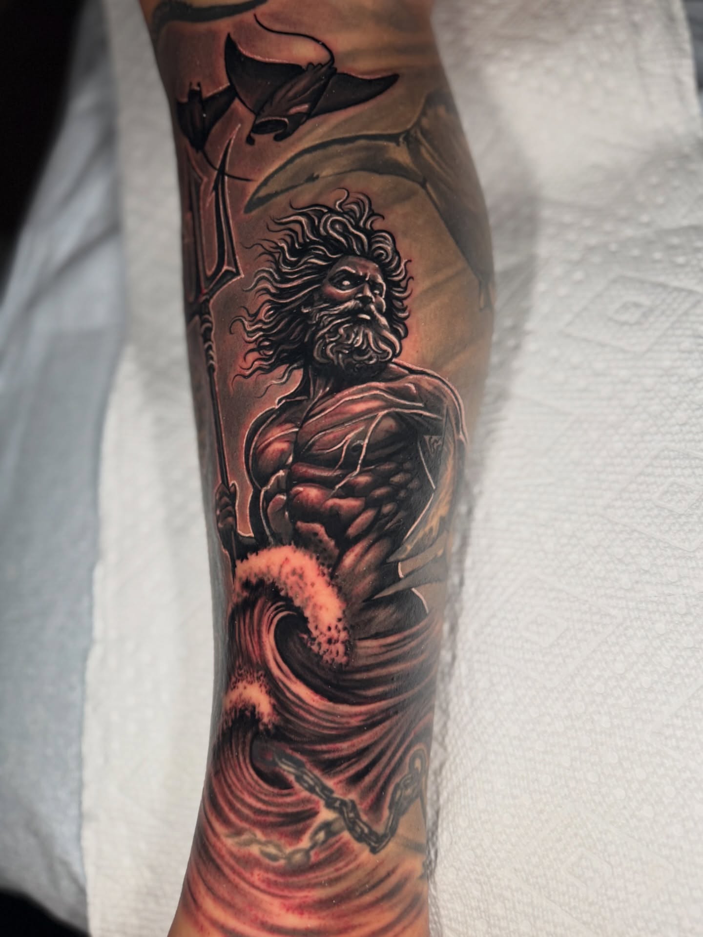 Poseidon realism tattoo on the forearm by Yanko Reyes