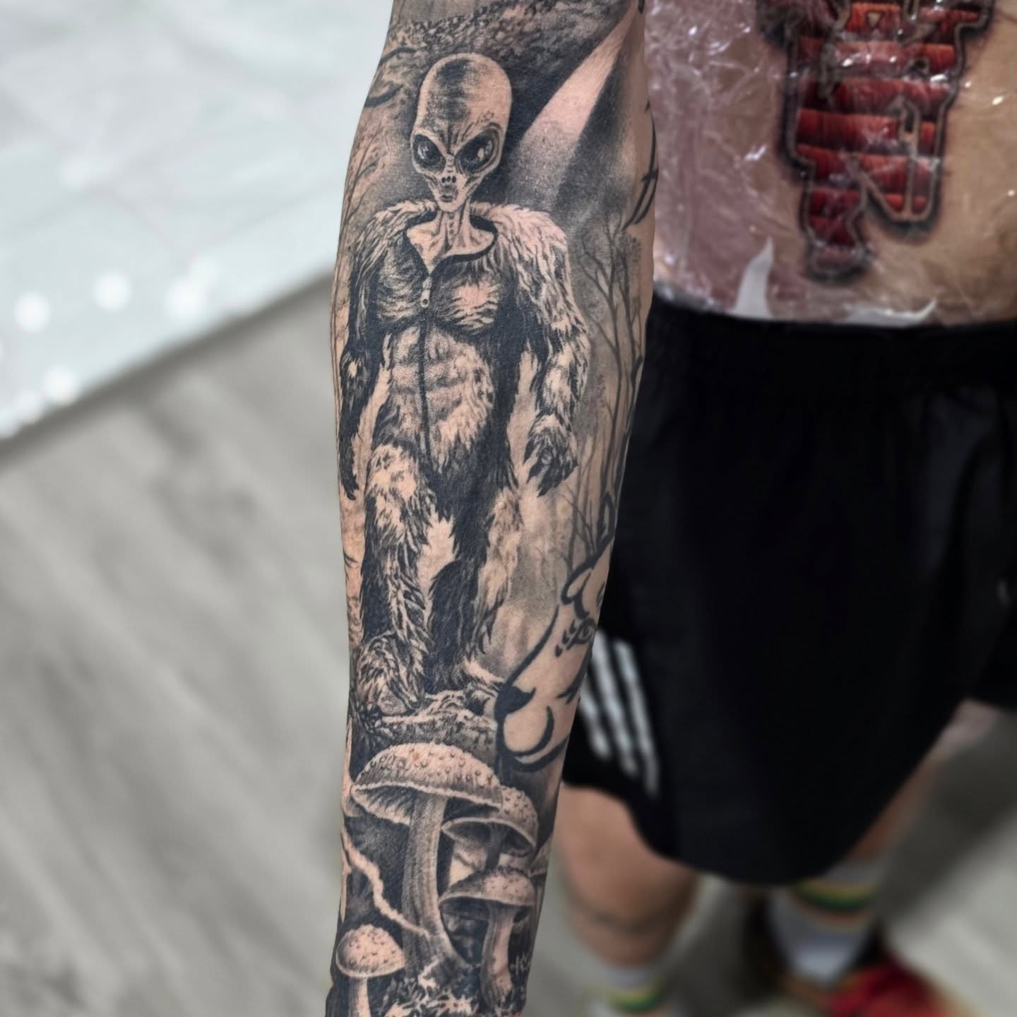 Tattoo by @tattoos_by_julia — black_and_grey, realism