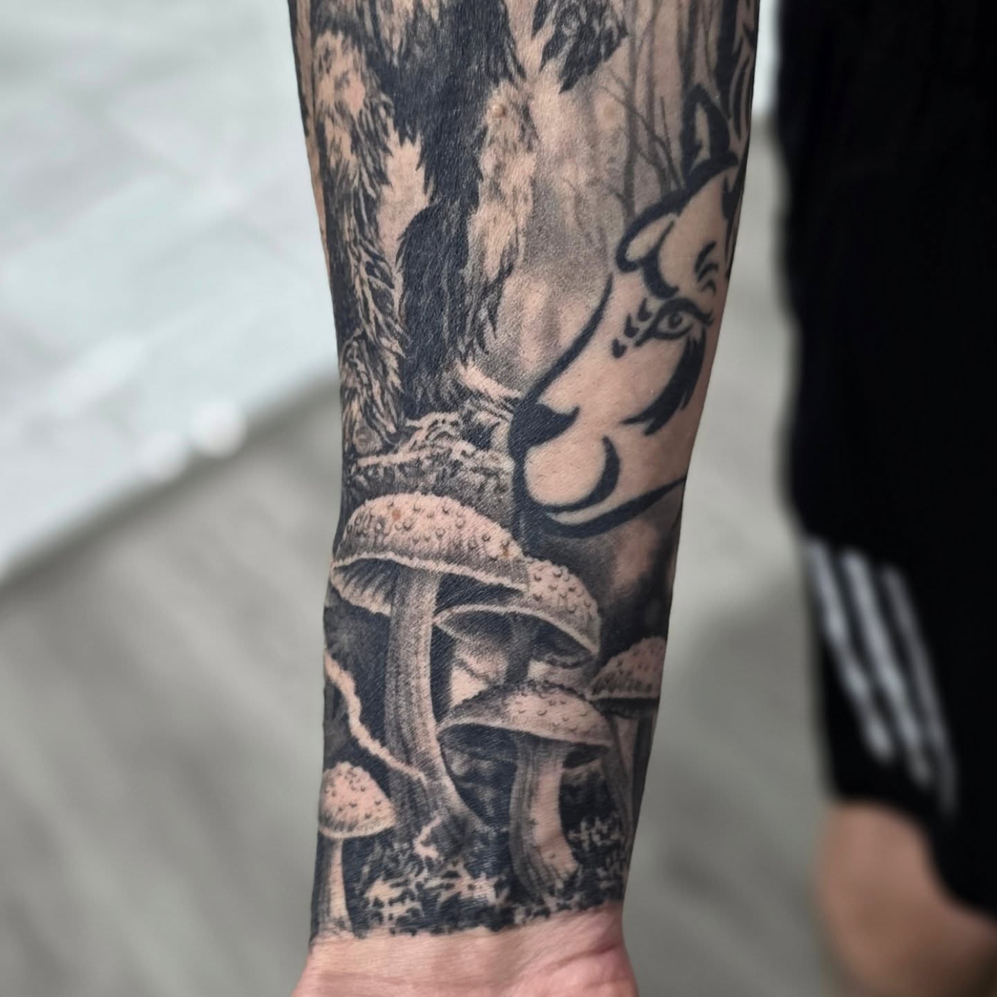 Tattoo by @tattoos_by_julia — black_and_grey, realism
