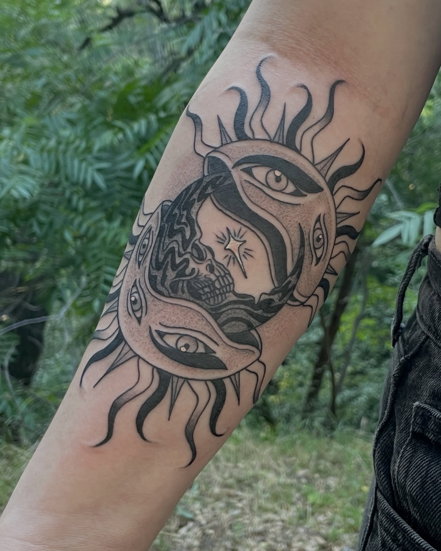 Sun and skull American traditional tattoo on the forearm by Austin Clark