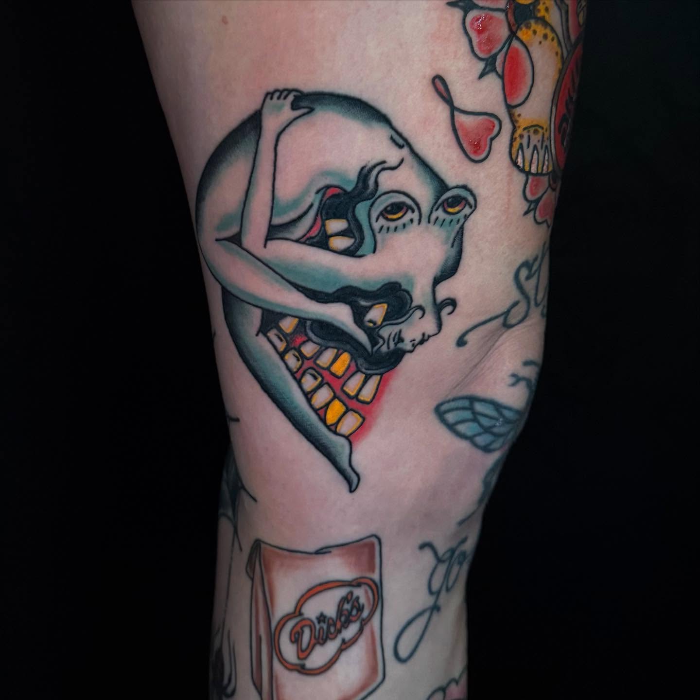 Skull with hands American traditional tattoo on the forearm by Jacie Aasen-Lupino