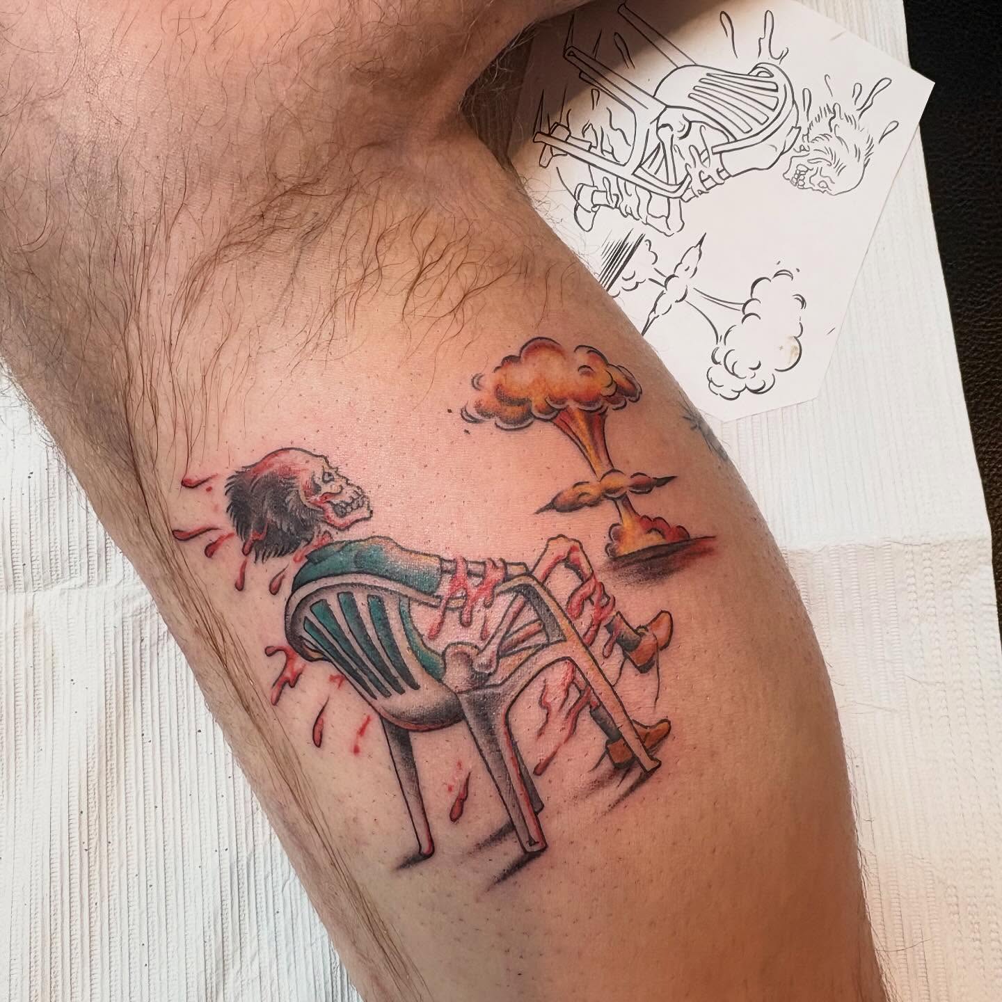 Nuclear explosion realism tattoo on the forearm by Adriana Wimler