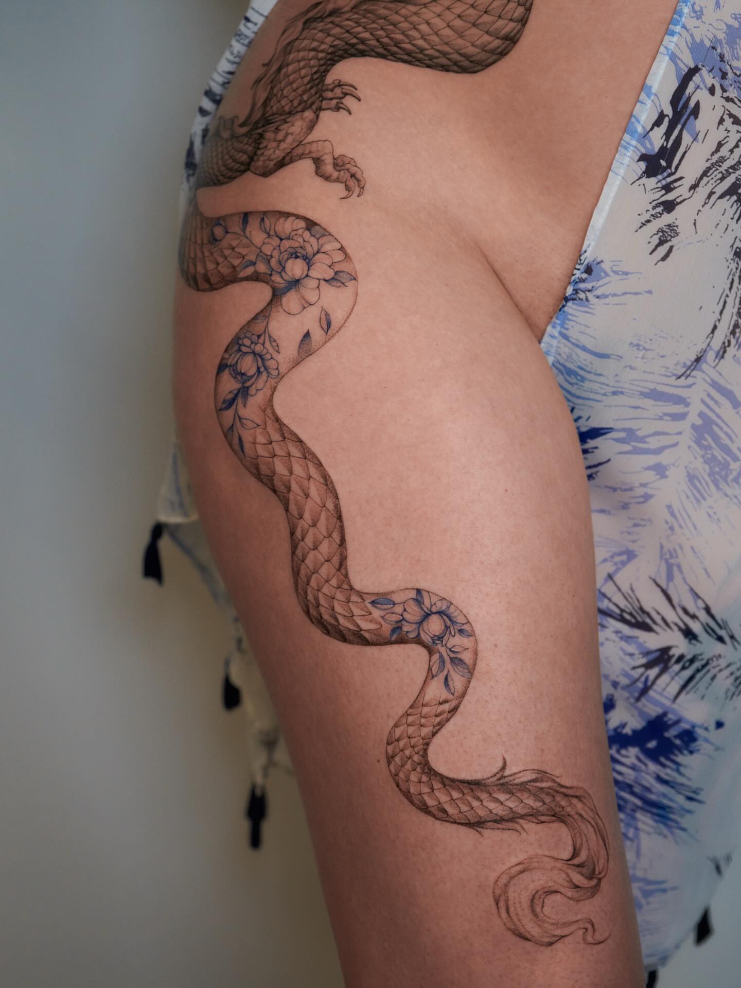 Dragon black and grey tattoo on the thigh by Tattoo artist LA ། Fine line, Micro realism