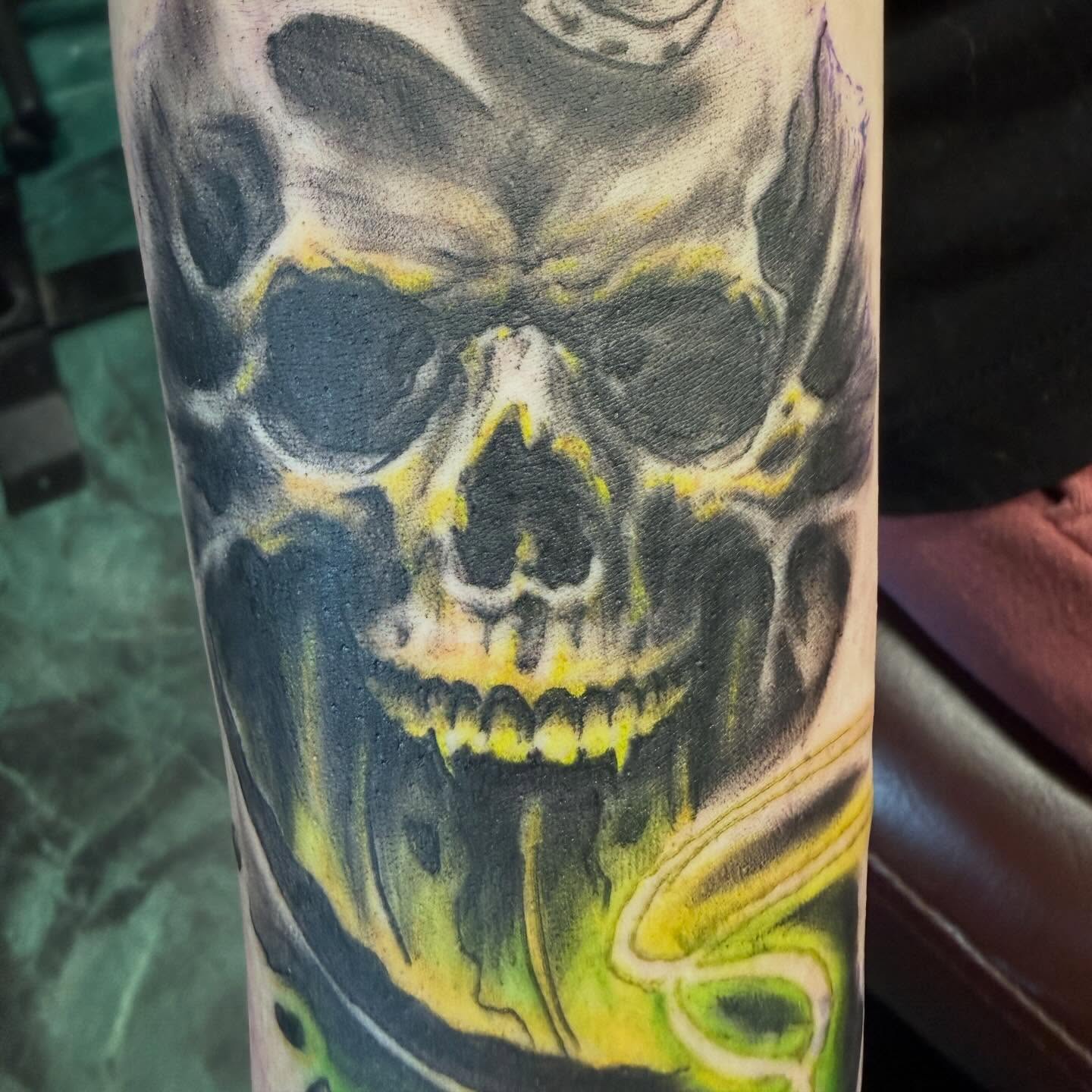Skull dark realism tattoo on the forearm by Devon Beyer, Mission, Kansas