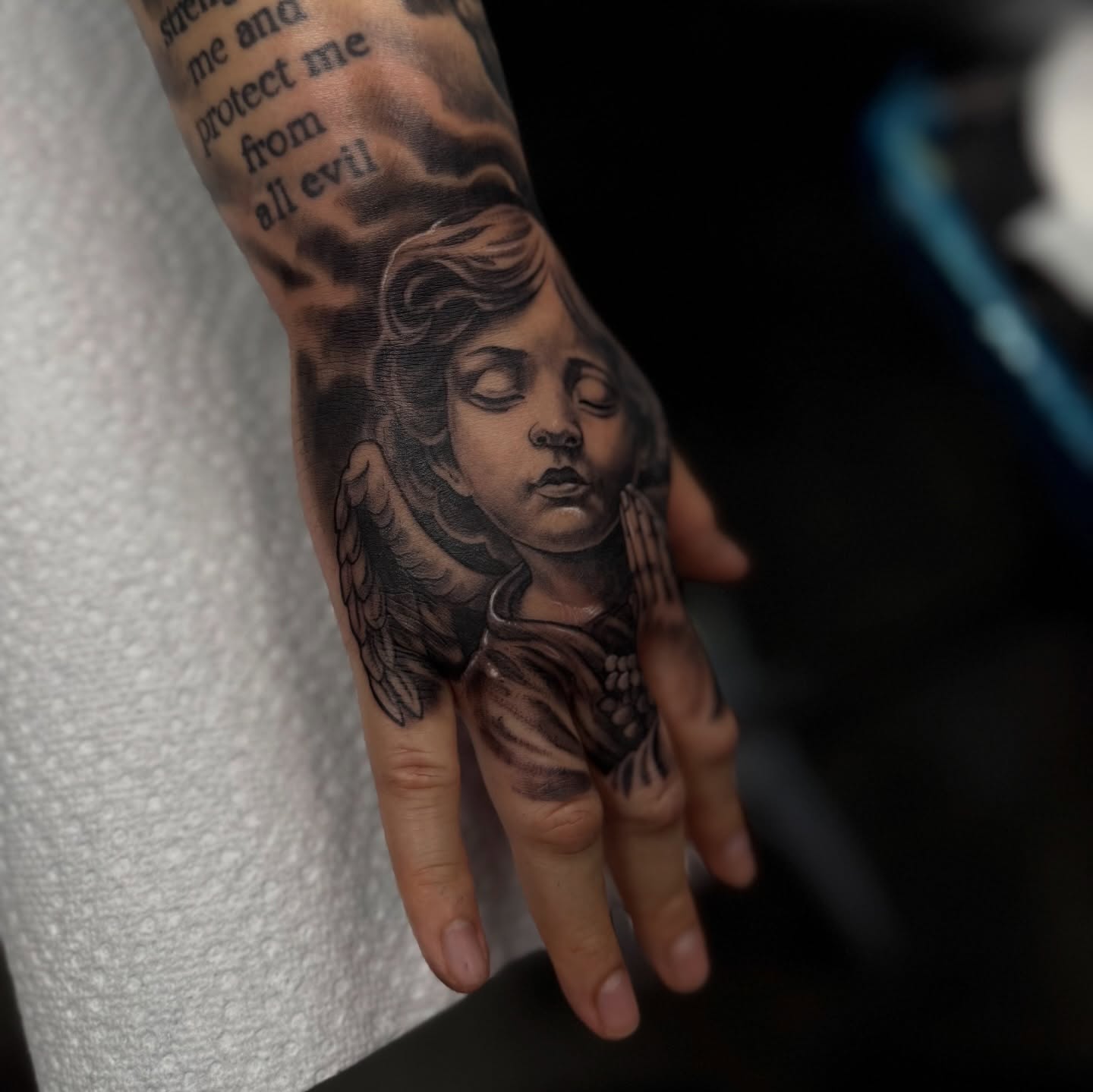 Angel realism tattoo on the hand by Tony Hernandez, Chicago, Illinois