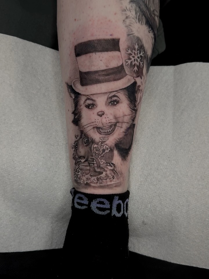 Cat in top hat realism tattoo on the forearm by jordyn ๐ญ