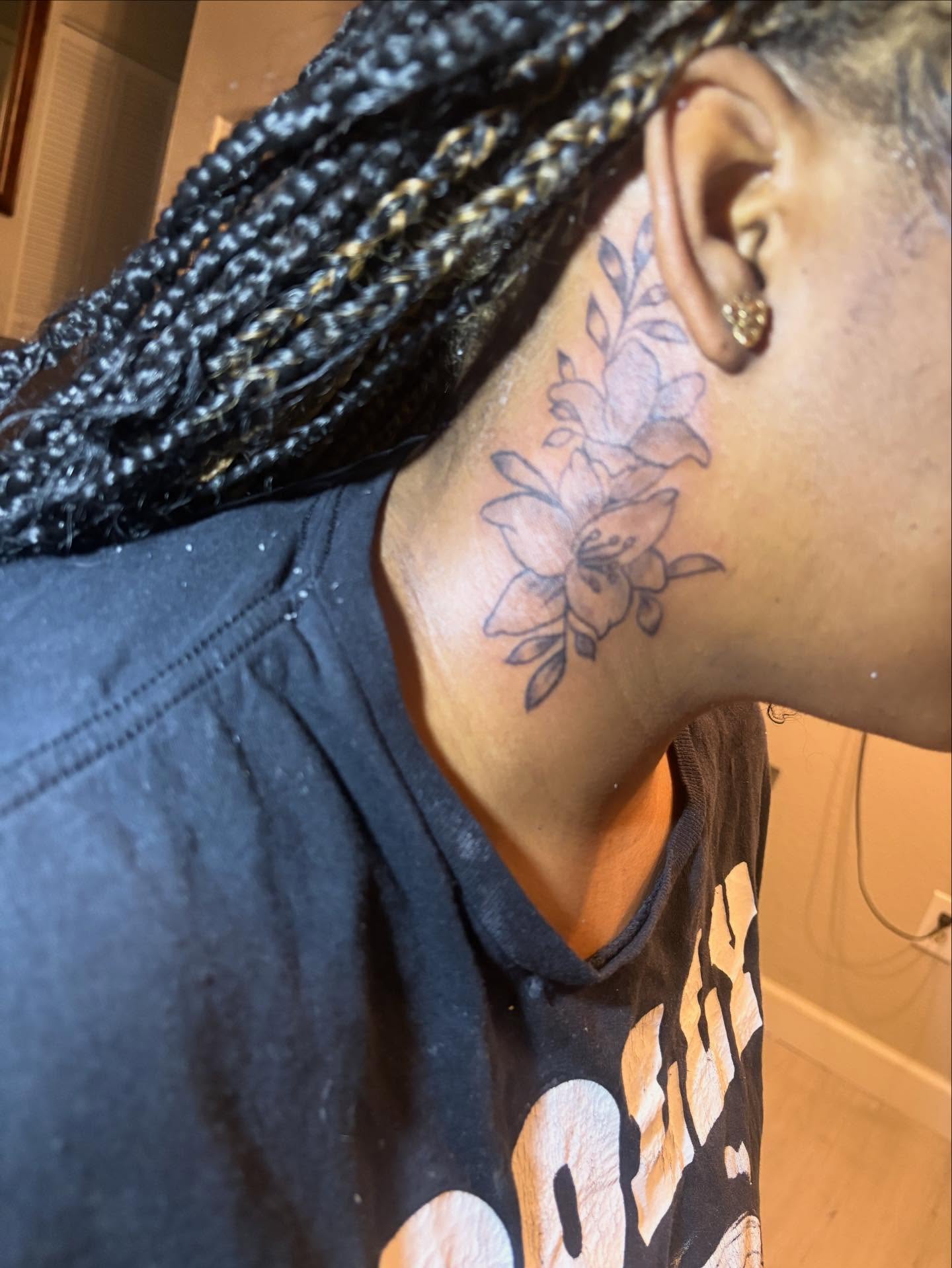 Flower black and grey tattoo on the neck by TP