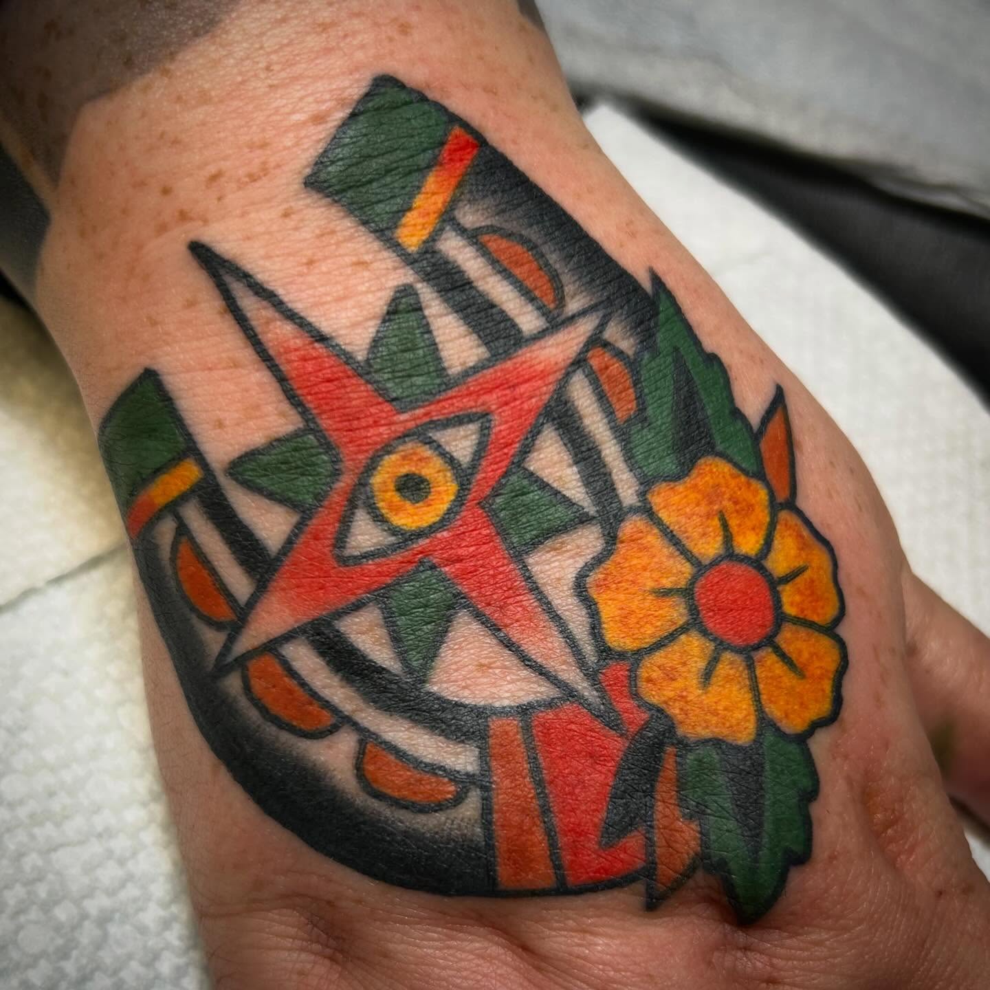 Tattoo by @erineinhorn — american_traditional, geometric