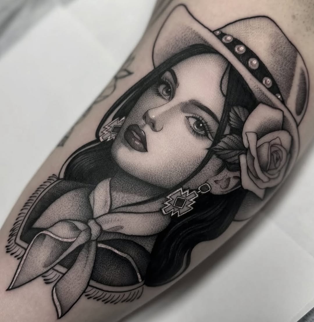 Cowgirl portrait with rose realism tattoo on the forearm by Luna Lucero