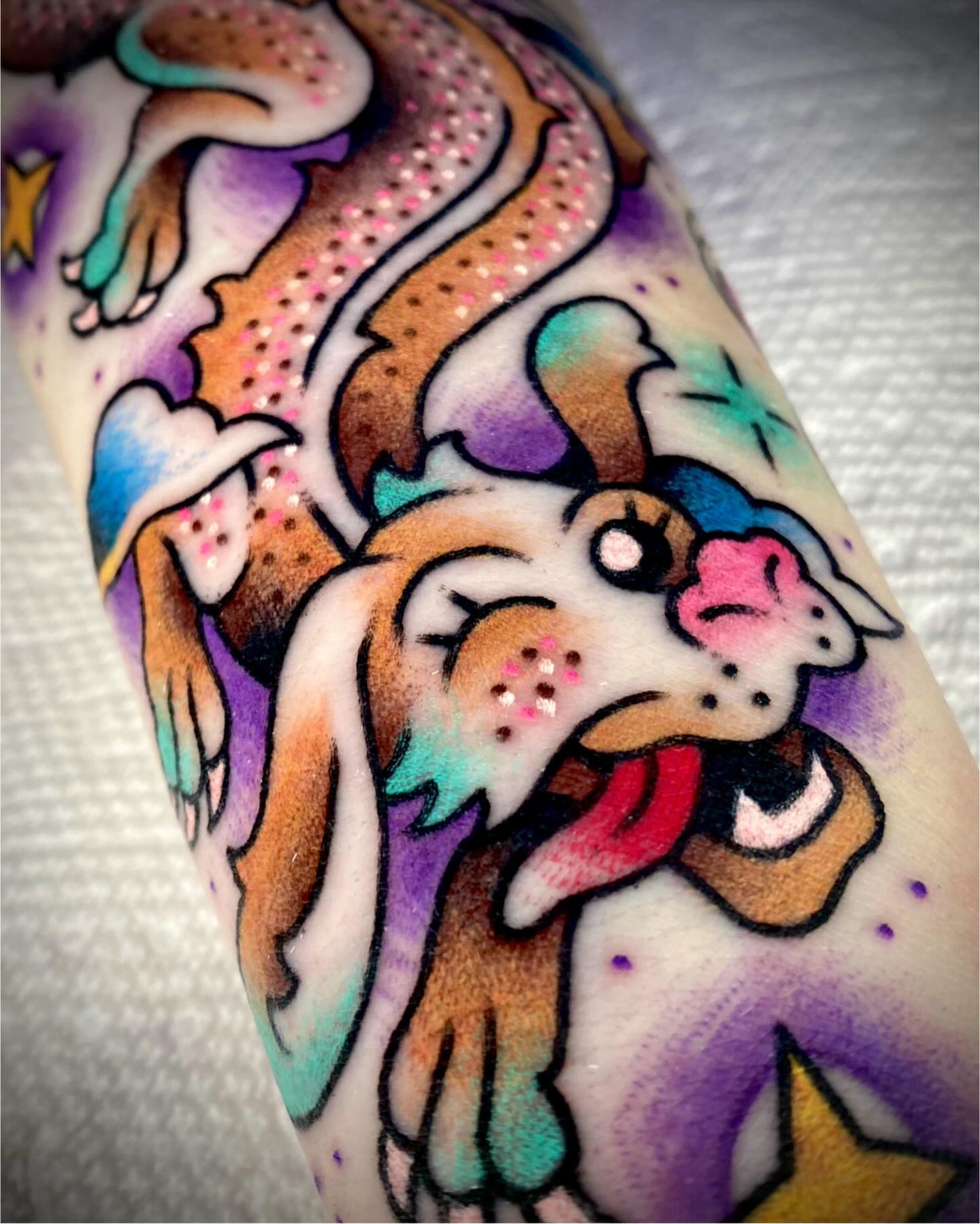 Dog dotwork tattoo on the forearm by Zach Knisley (Wiz)