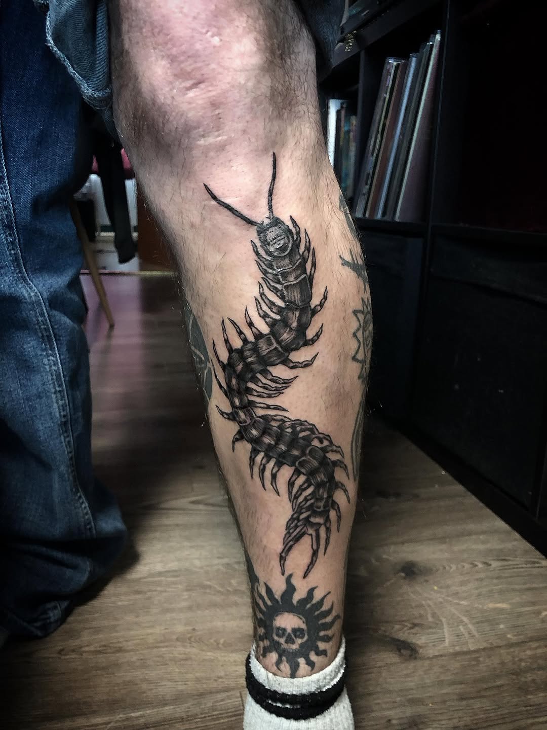 Centipede realism tattoo on the calf by Ink of Winchester