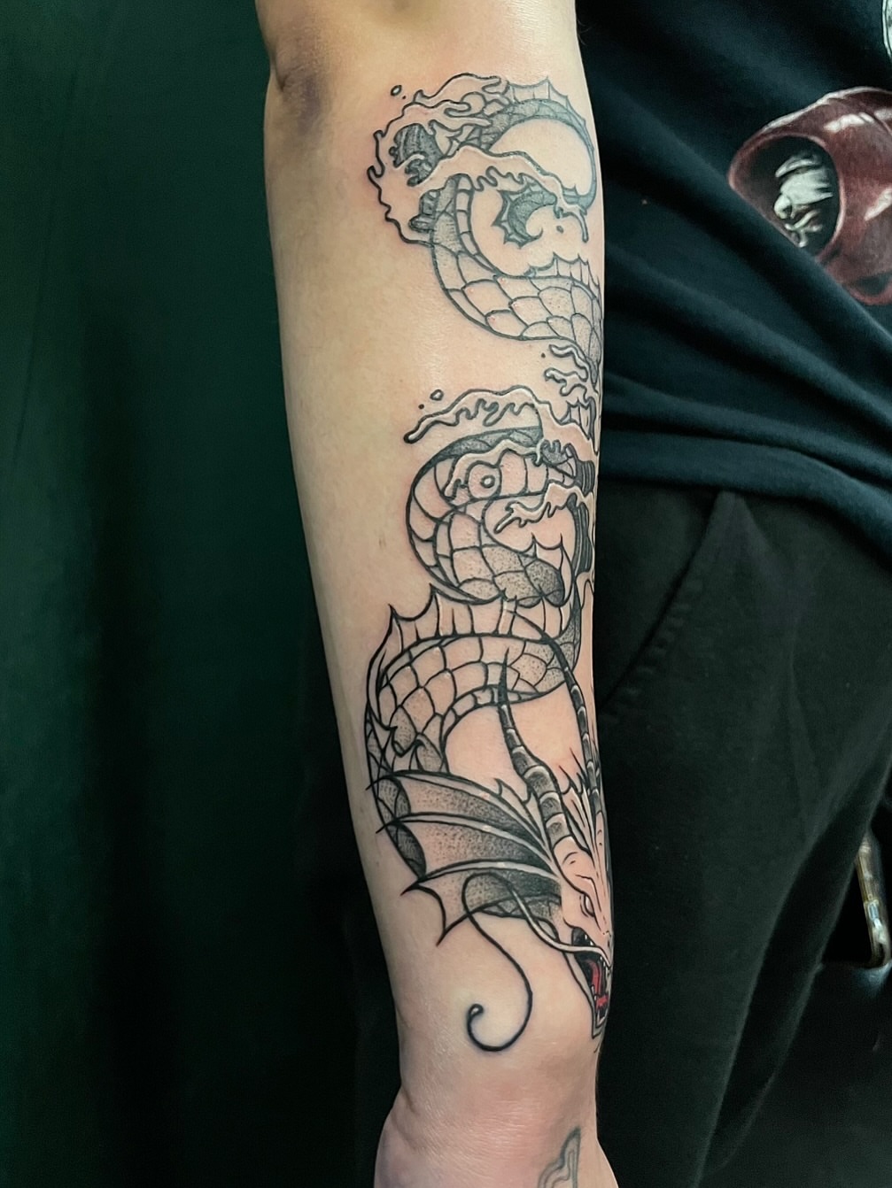 Dragon black and grey tattoo on the forearm by 𝕲𝖗𝖆𝖈𝖊 🥀 ᴛᴀᴛᴛᴏᴏ