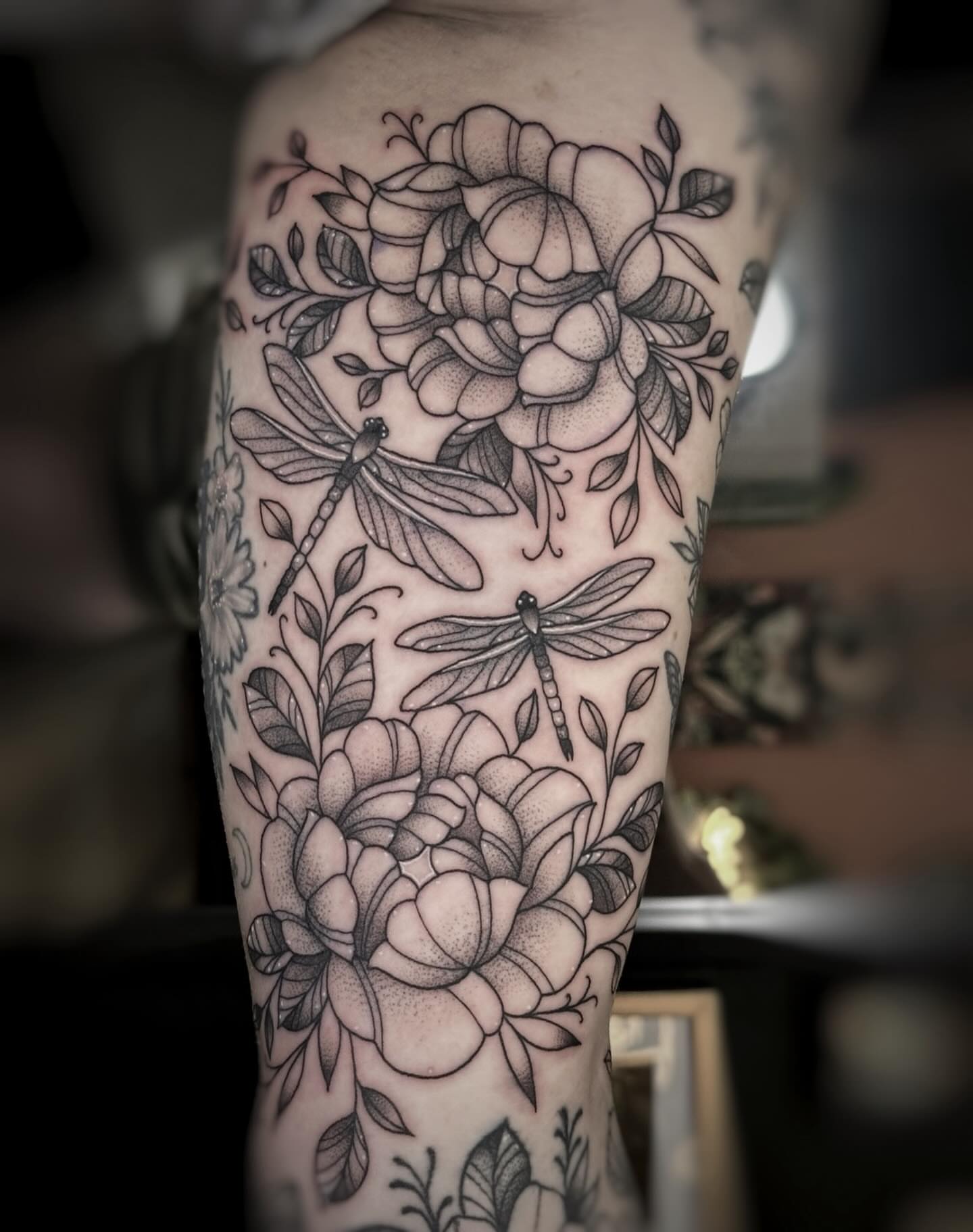 Flowers and dragonflies dotwork tattoo on the forearm by 𓍊𓋼 Joana Diane Tattoos 𓋼𓍊
