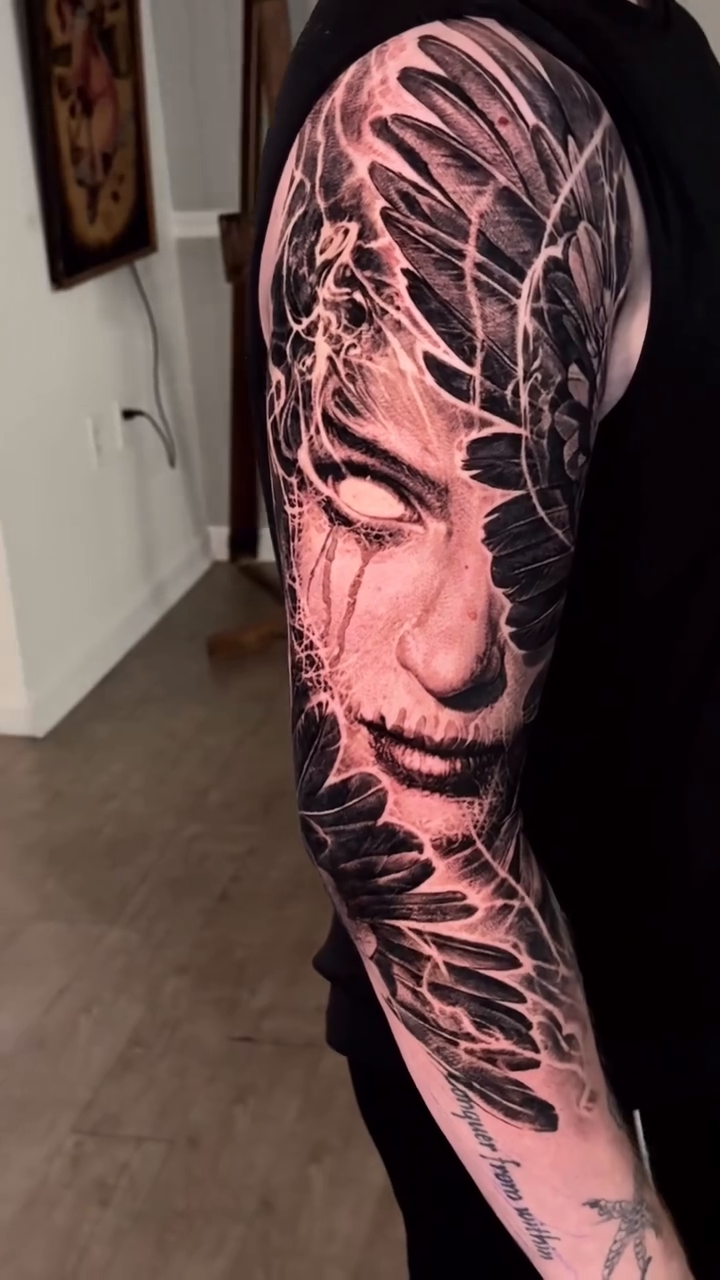 Tattoo by @robbylatos — dark_realism, black_and_grey
