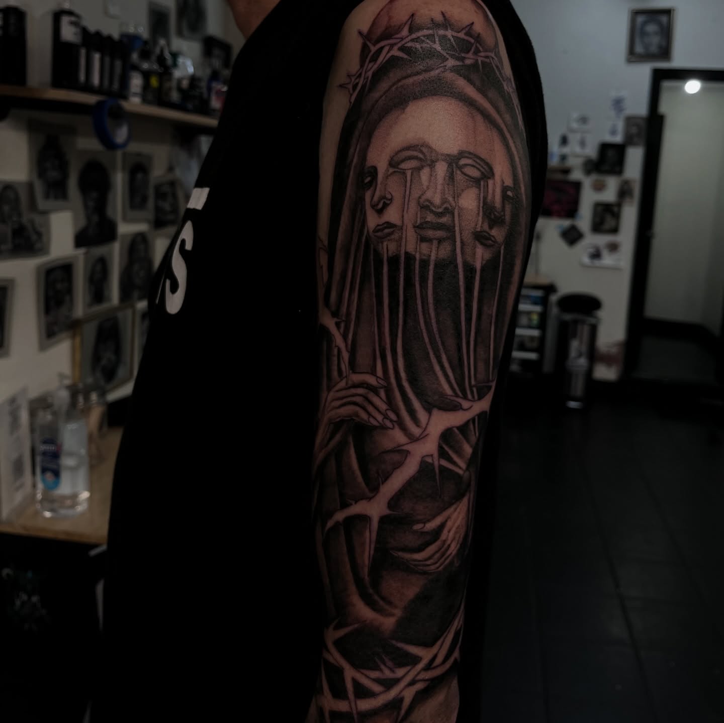 Religious figure realism tattoo on the forearm by suzie