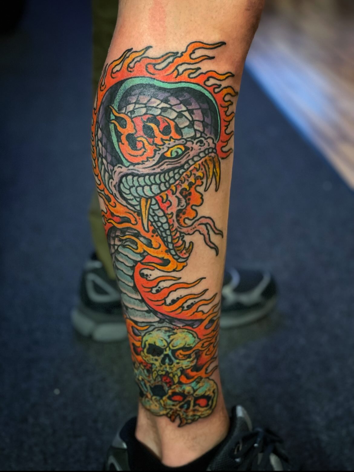 Flaming dragon japanese irezumi tattoo on the forearm by Zac Blevins