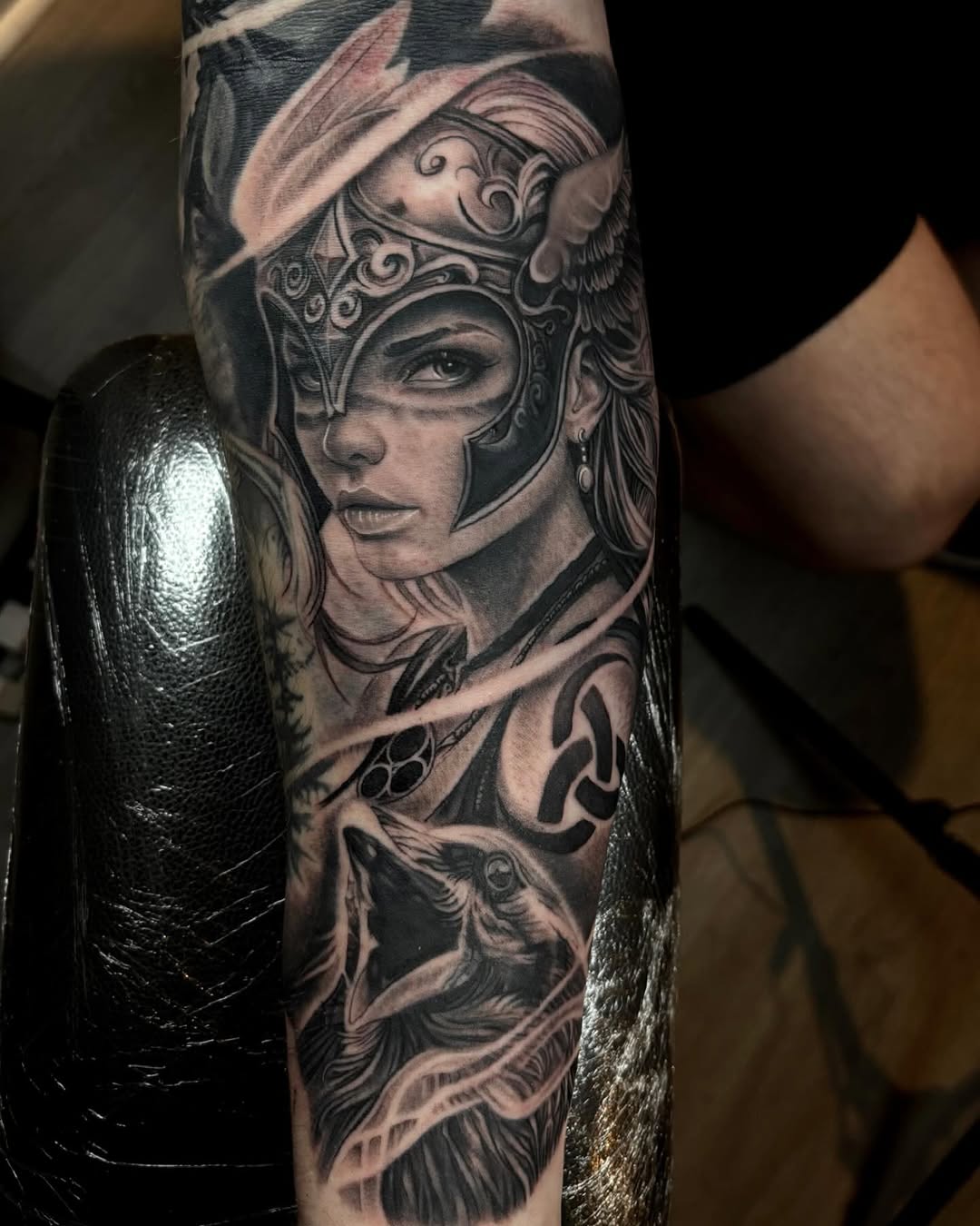 Viking woman and wolf realism tattoo on the forearm by Jayden A