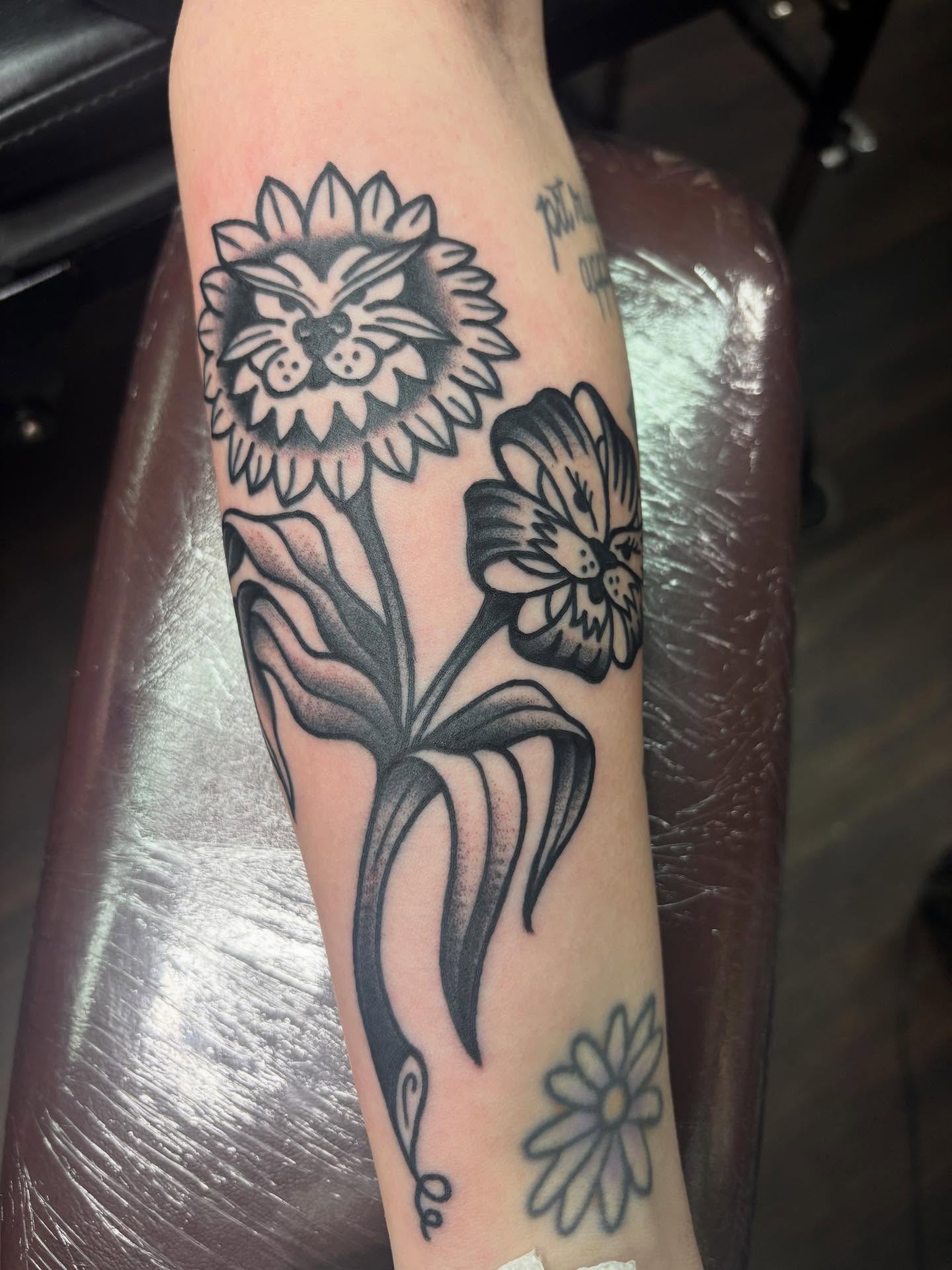 Sunflower and flower black and grey tattoo on the forearm by ✨Shelby ✨