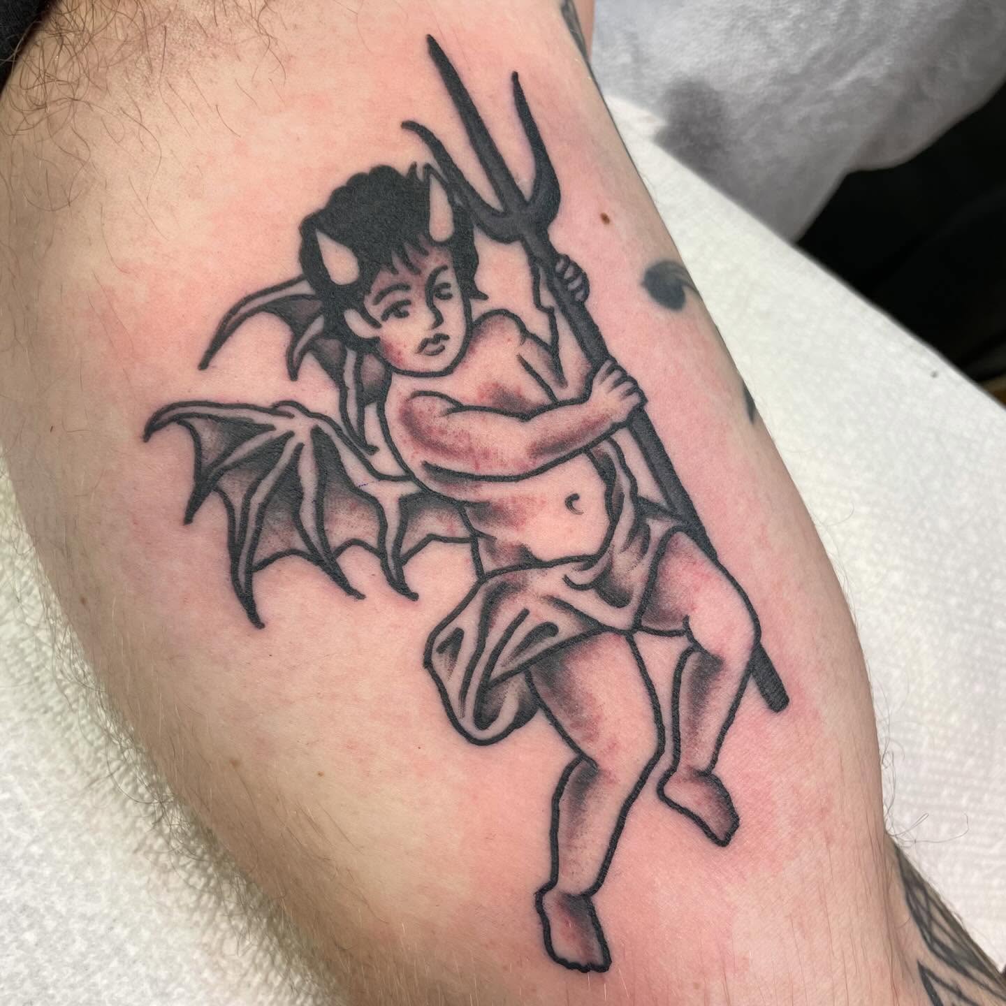 Demons black and grey tattoo on the forearm by 𝐒𝐚𝐦𝐬𝐨𝐧𝐋𝐚𝐳𝐚𝐫𝐭𝐞