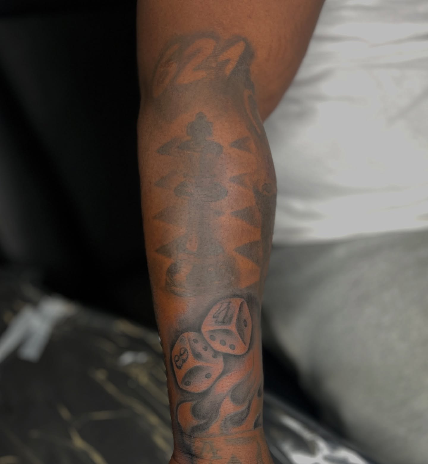 Dice black and grey tattoo on the forearm by ๐AK